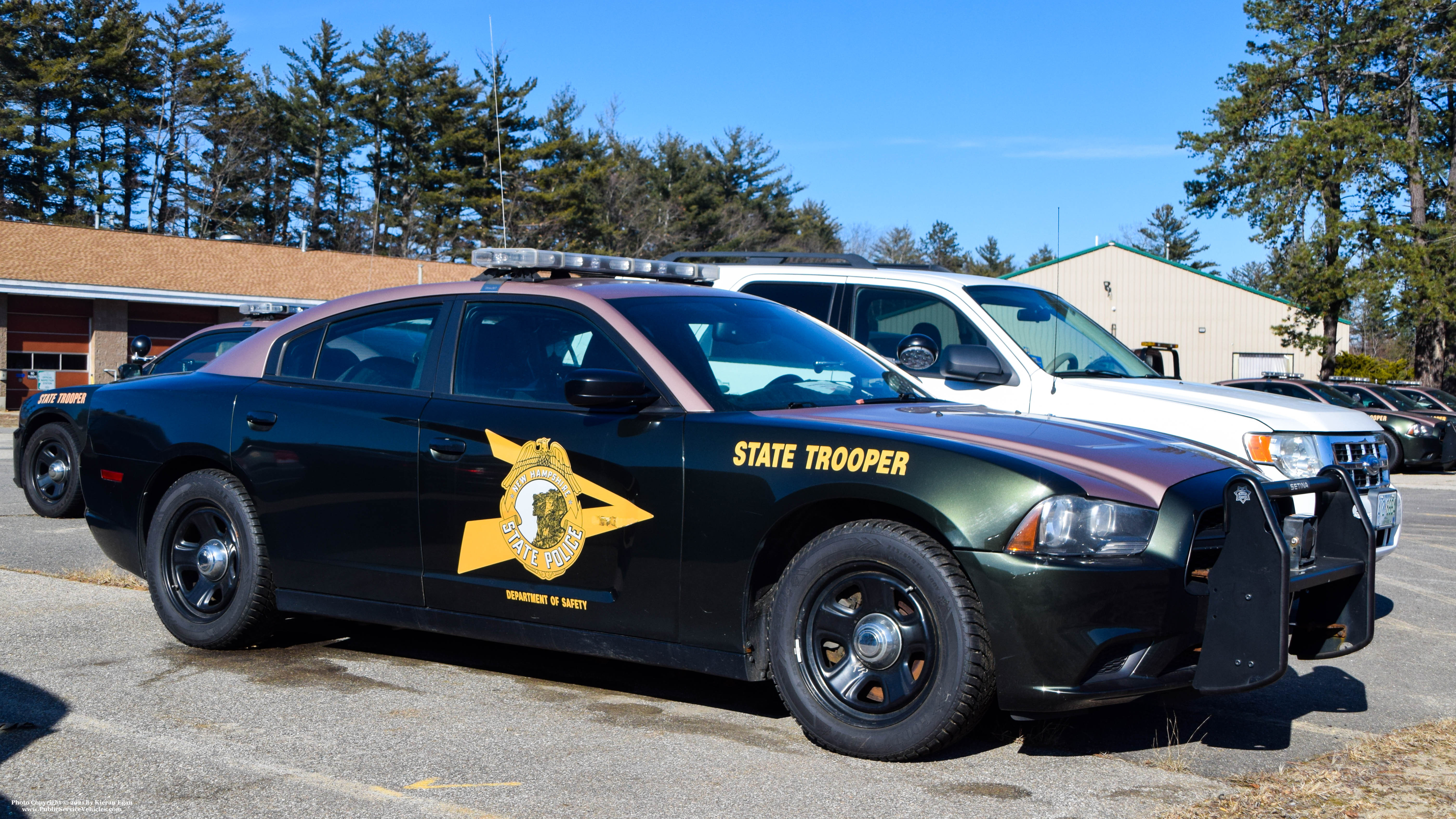 A photo  of New Hampshire State Police
            Cruiser 916, a 2011-2014 Dodge Charger             taken by Kieran Egan