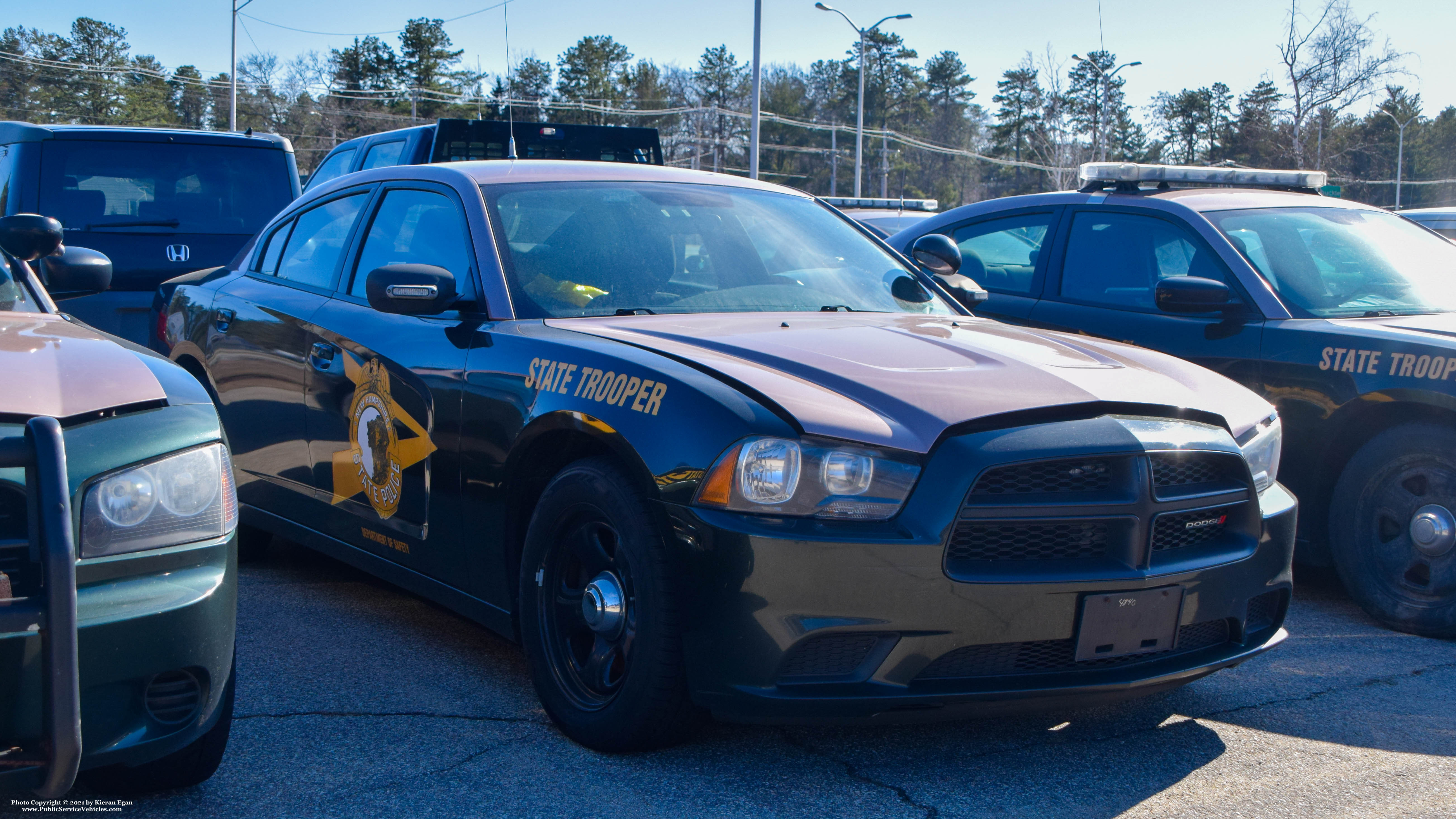 A photo  of New Hampshire State Police
            Unassigned Cruiser, a 2011-2014 Dodge Charger             taken by Kieran Egan