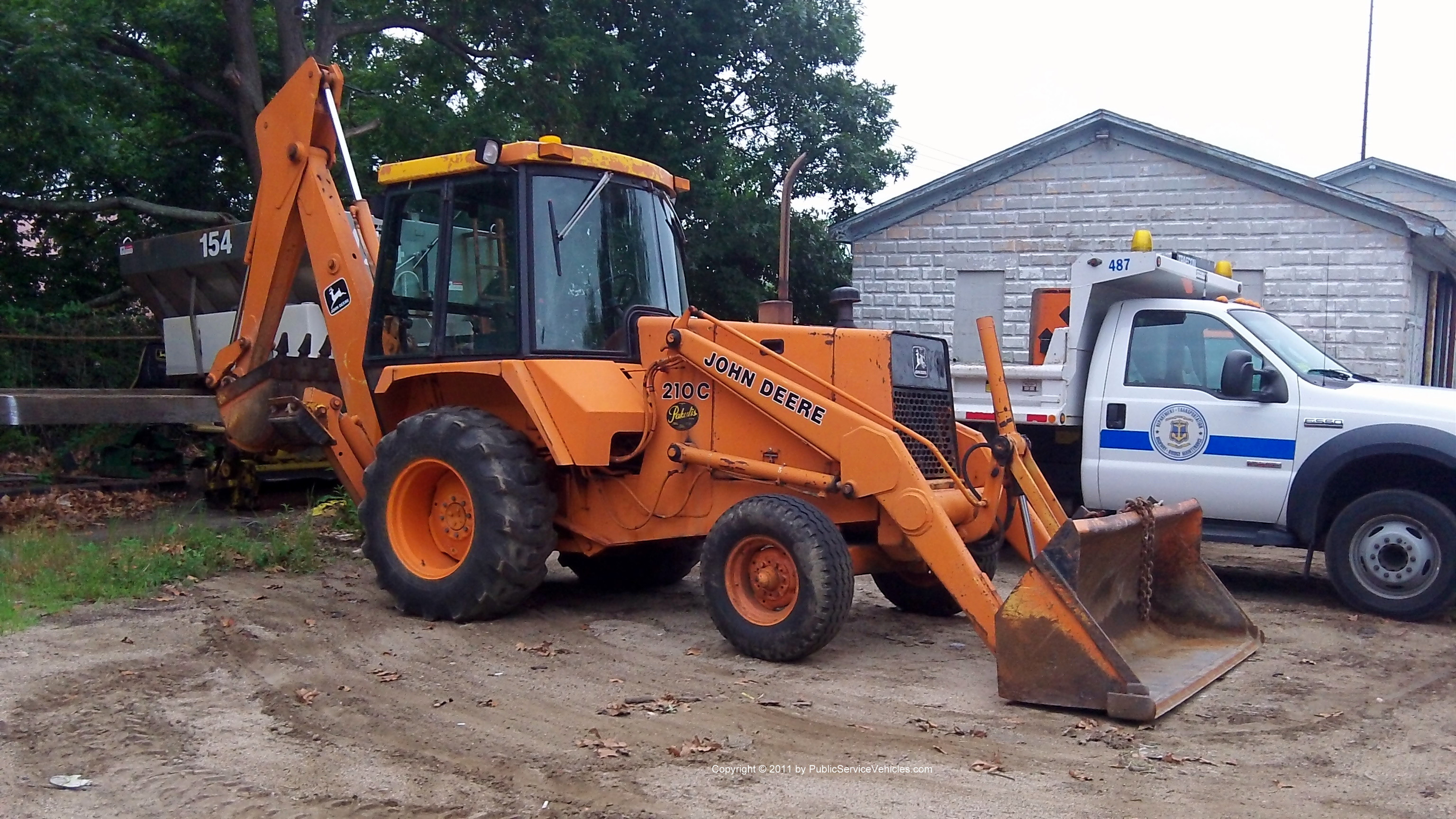 A photo  of Rhode Island Department of Transportation
            Backhoe 1078, a 1980-2010 John Deere 210C             taken by Kieran Egan