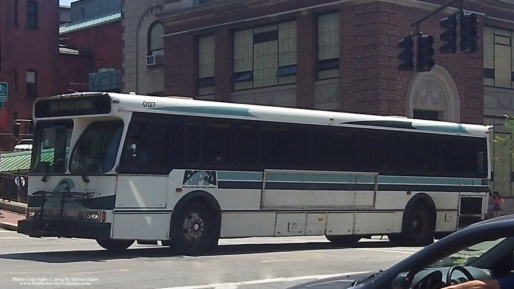 A photo  of Rhode Island Public Transit Authority
            Bus 0127, a 2001 Orion V 05.501             taken by Kieran Egan