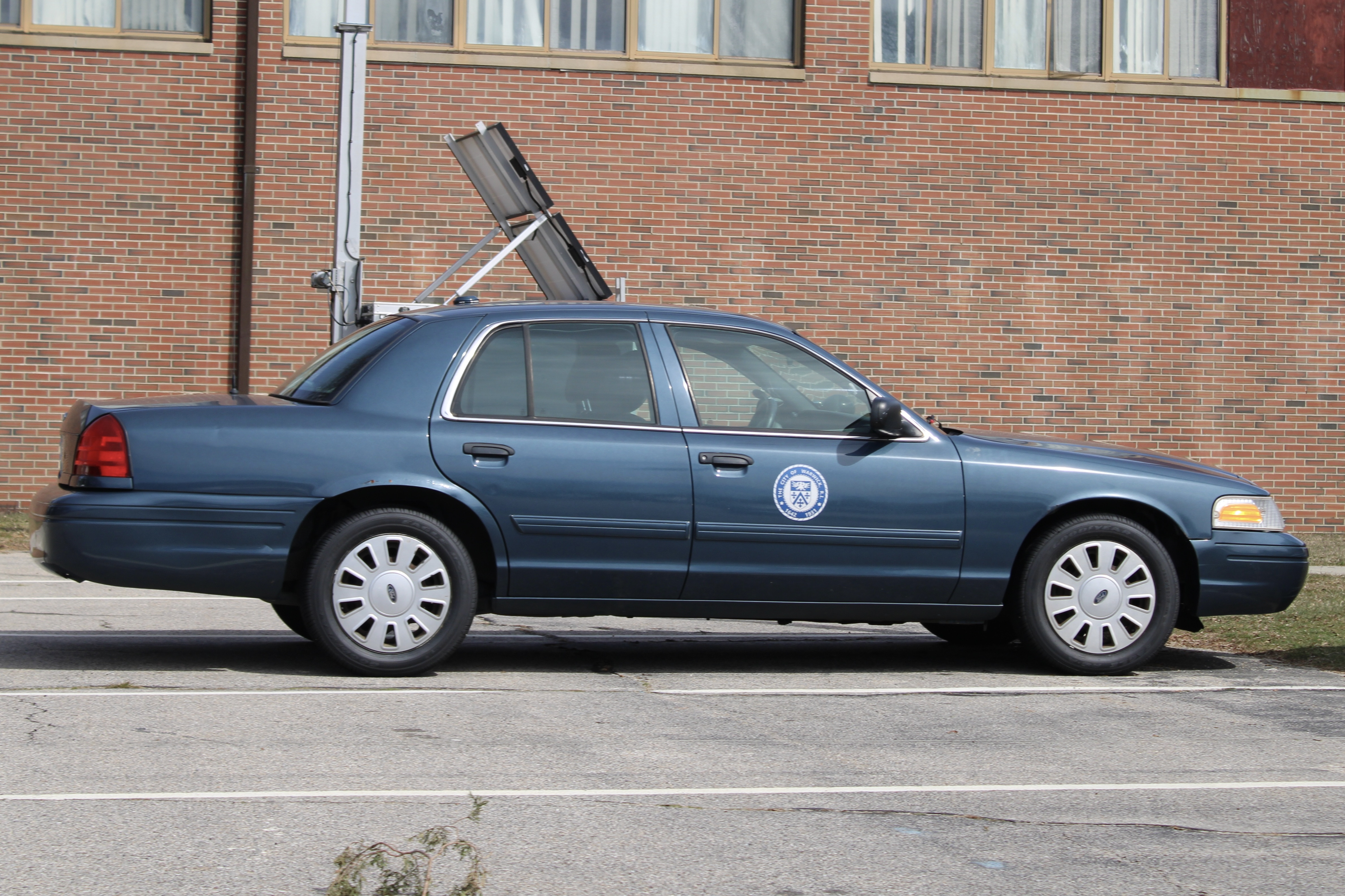 A photo  of Warwick Public Works
            Car 5911, a 2009-2011 Ford Crown Victoria Police Interceptor             taken by @riemergencyvehicles