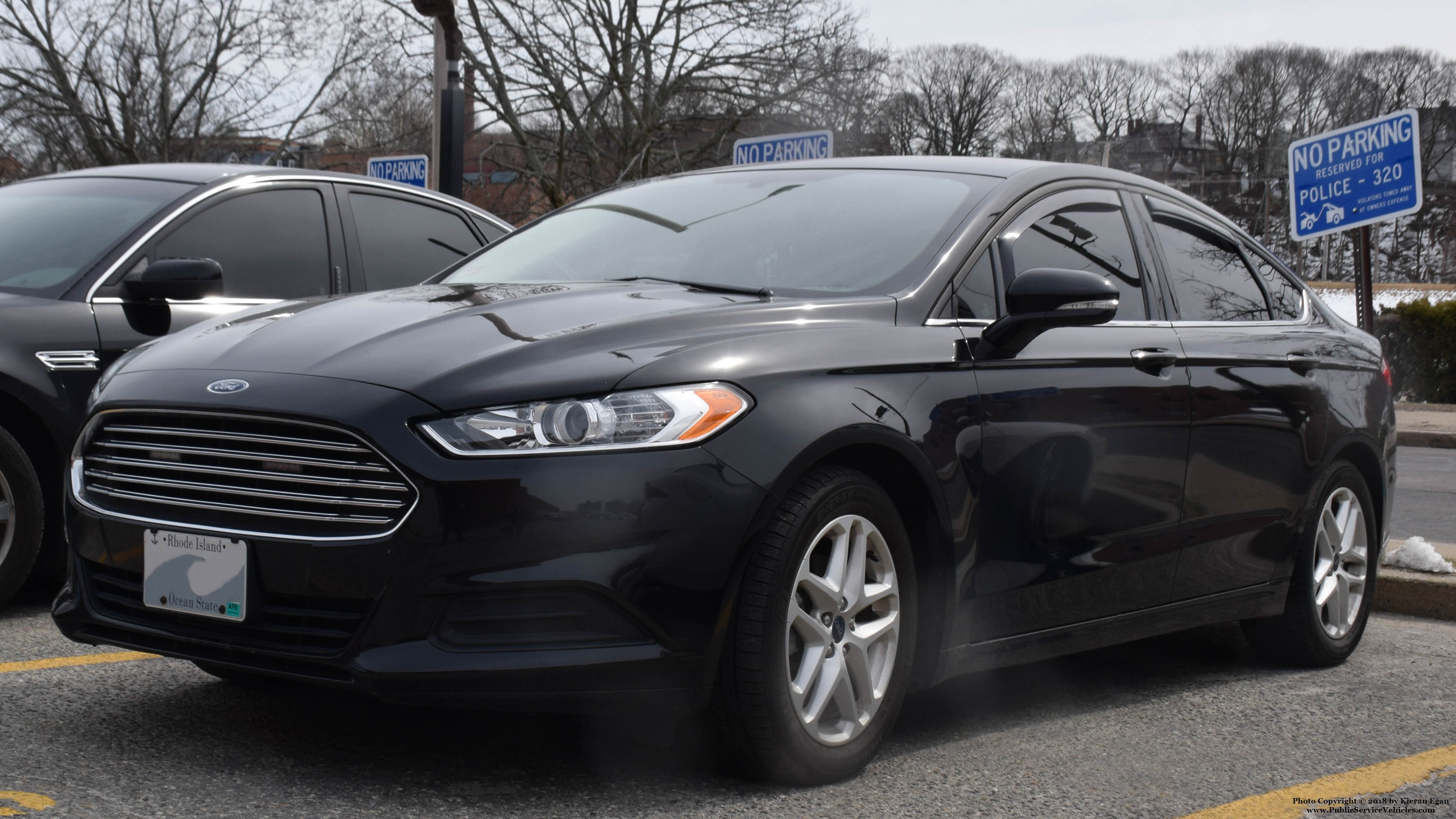 A photo  of Woonsocket Police
            Cruiser 320, a 2013-2018 Ford Fusion             taken by Kieran Egan