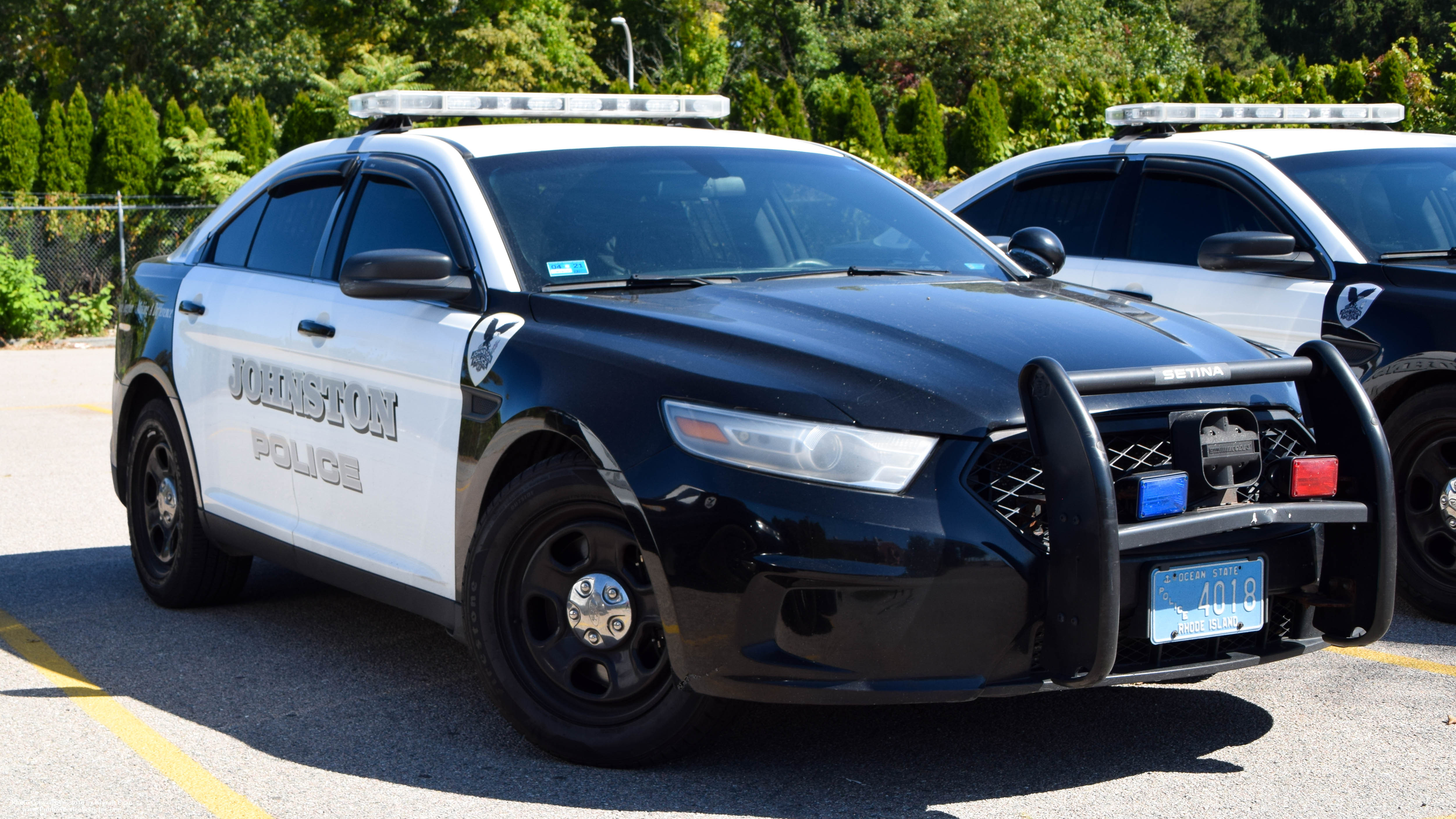 A photo  of Johnston Police
            Cruiser 4018, a 2014 Ford Police Interceptor Sedan             taken by Kieran Egan