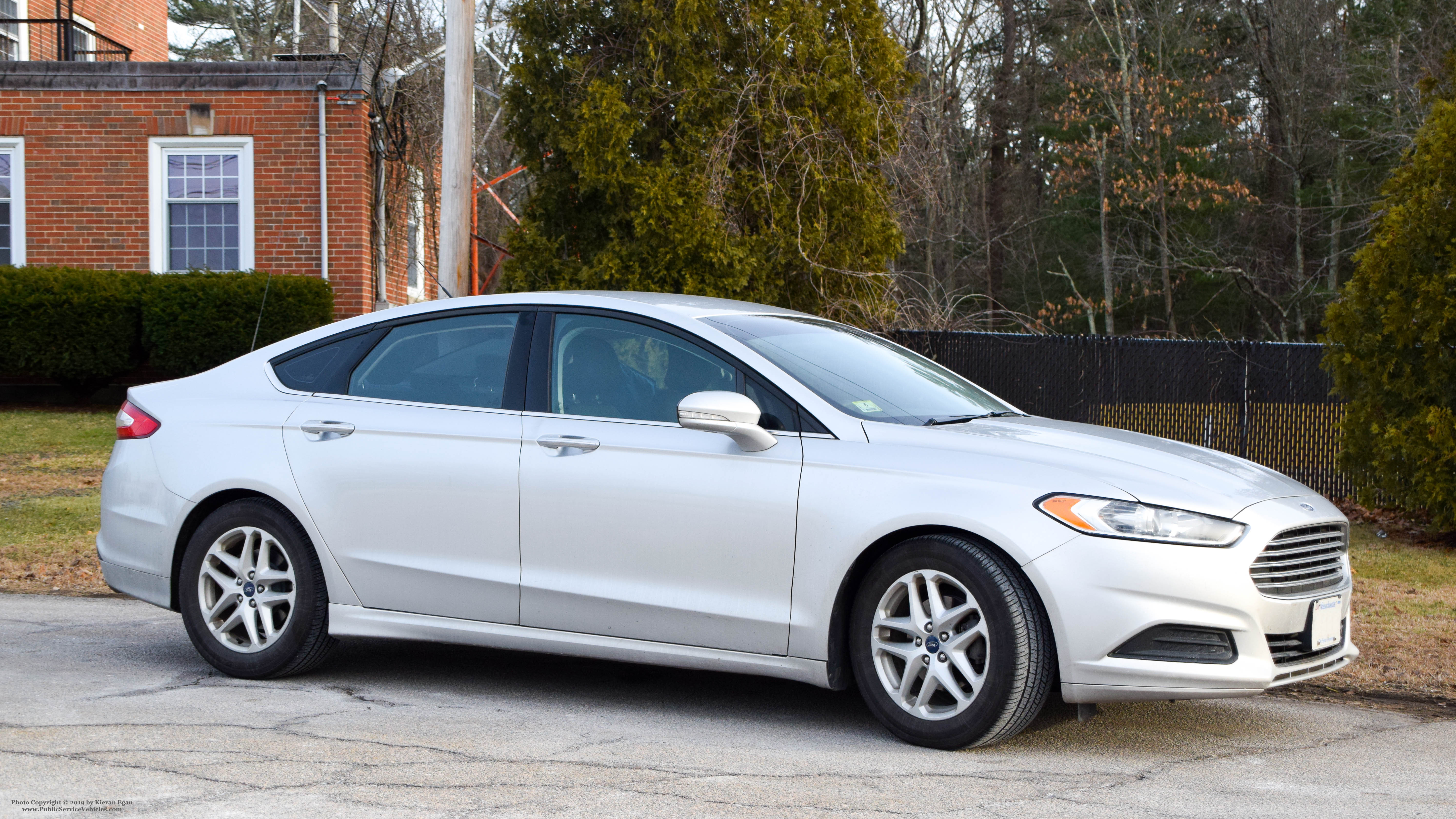 A photo  of Massachusetts State Police
            Unmarked Unit, a 2012-2019 Ford Fusion             taken by Kieran Egan