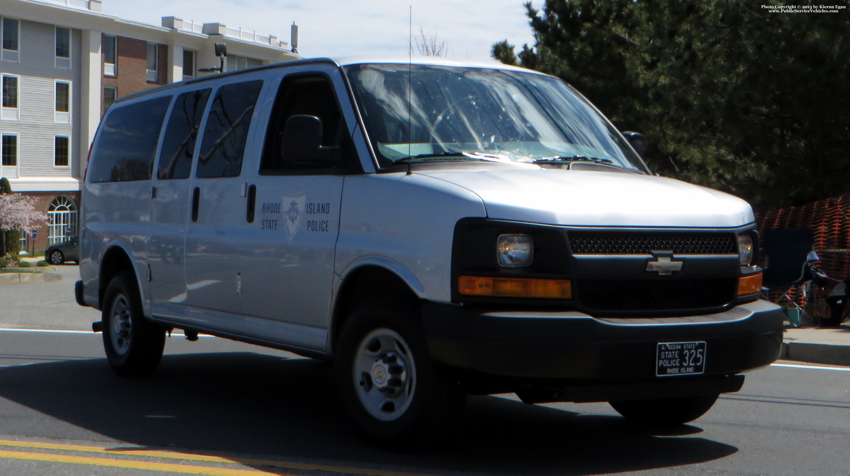 A photo  of Rhode Island State Police
            Cruiser 325, a 2003-2020 Chevrolet Express             taken by Kieran Egan