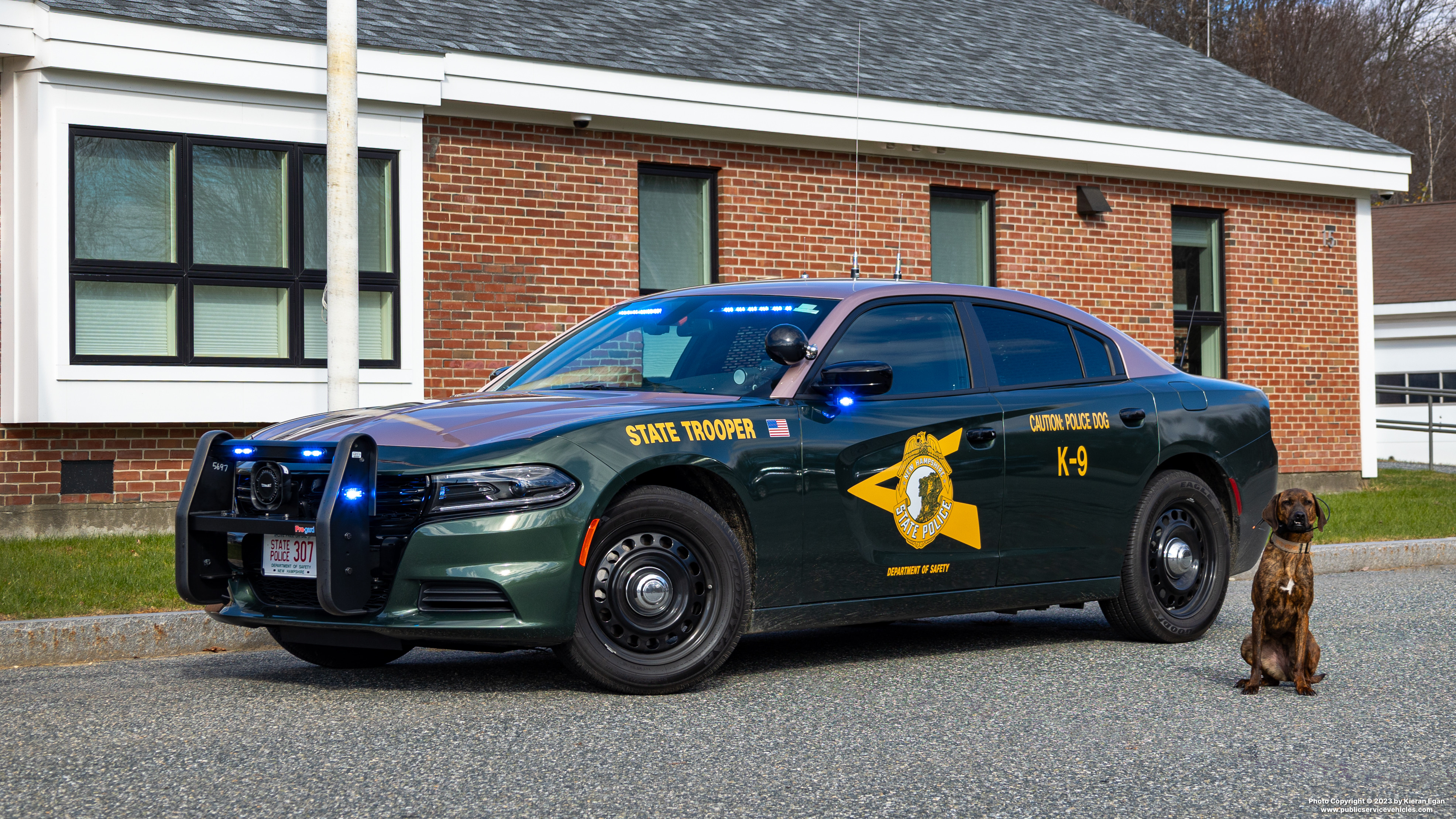 A photo  of New Hampshire State Police
            Cruiser 307, a 2022 Dodge Charger             taken by Kieran Egan
