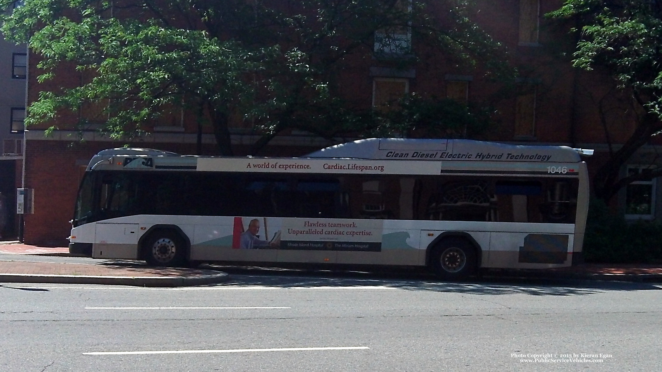 A photo  of Rhode Island Public Transit Authority
            Bus 1046, a 2010 Gillig BRT HEV             taken by Kieran Egan