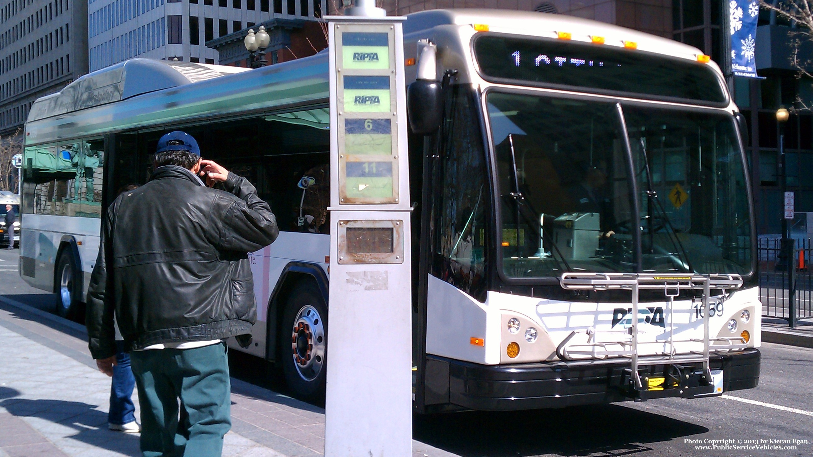 A photo  of Rhode Island Public Transit Authority
            Bus 1059, a 2010 Gillig BRT HEV             taken by Kieran Egan