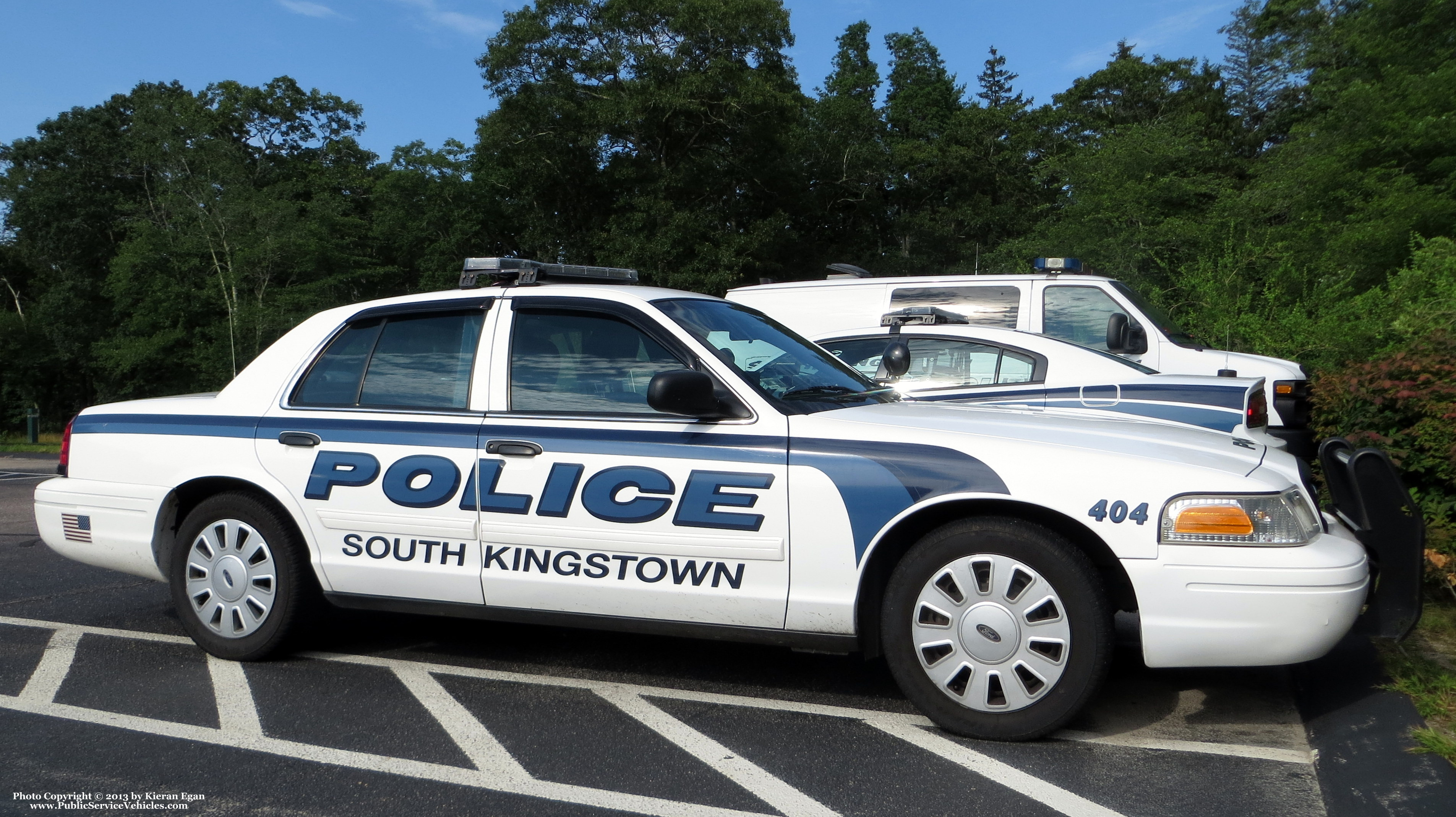 A photo  of South Kingstown Police
            Cruiser 404, a 2009-2011 Ford Crown Victoria Police Interceptor             taken by Kieran Egan