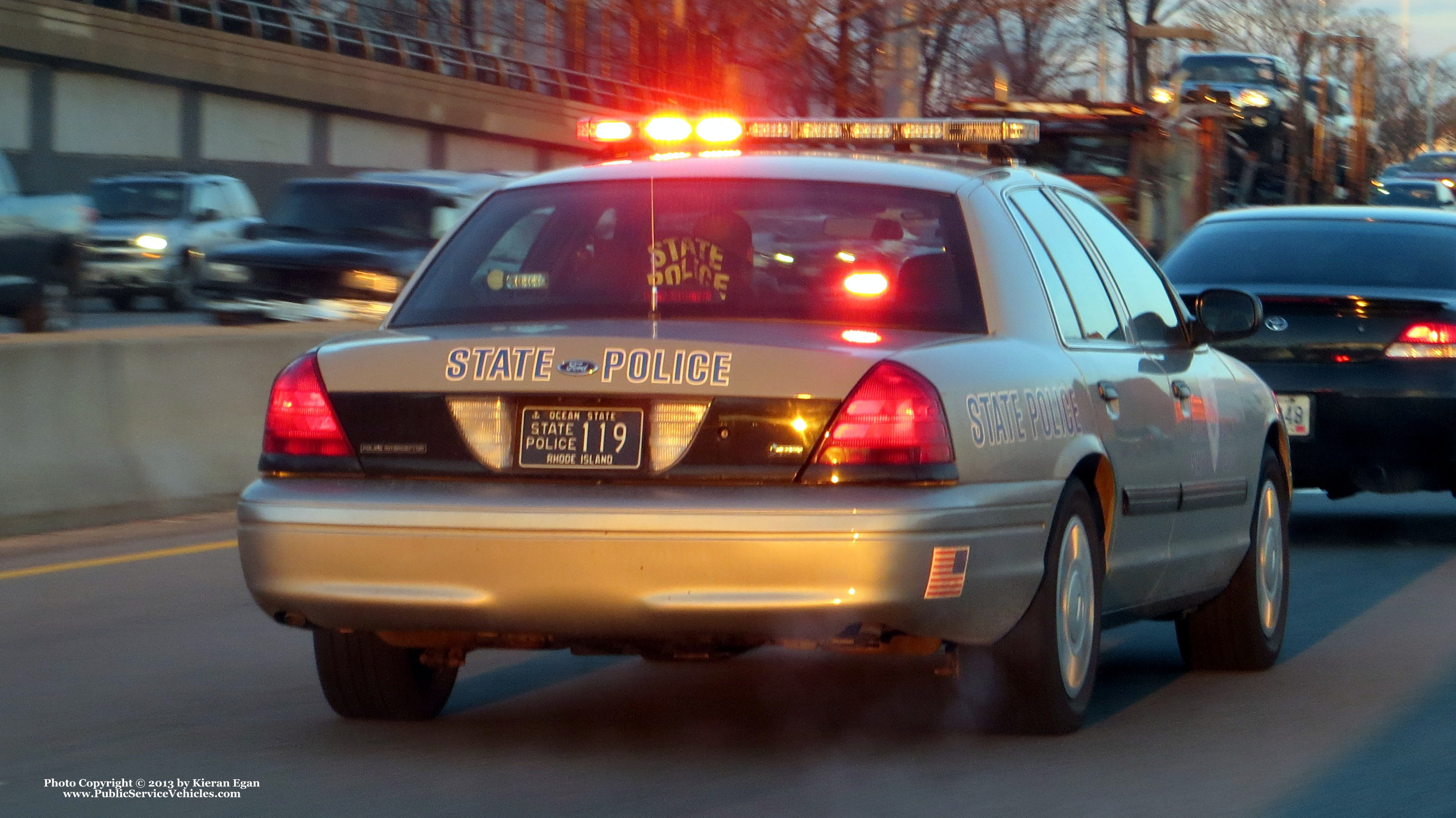 A photo  of Rhode Island State Police
            Cruiser 119, a 2009-2011 Ford Crown Victoria Police Interceptor             taken by Kieran Egan