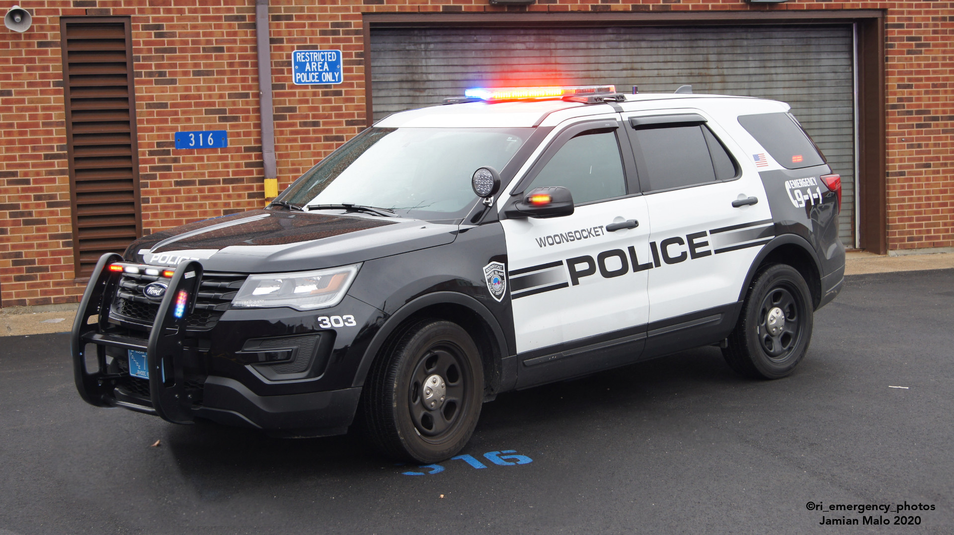 A photo  of Woonsocket Police
            Cruiser 303, a 2019 Ford Police Interceptor Utility             taken by Jamian Malo