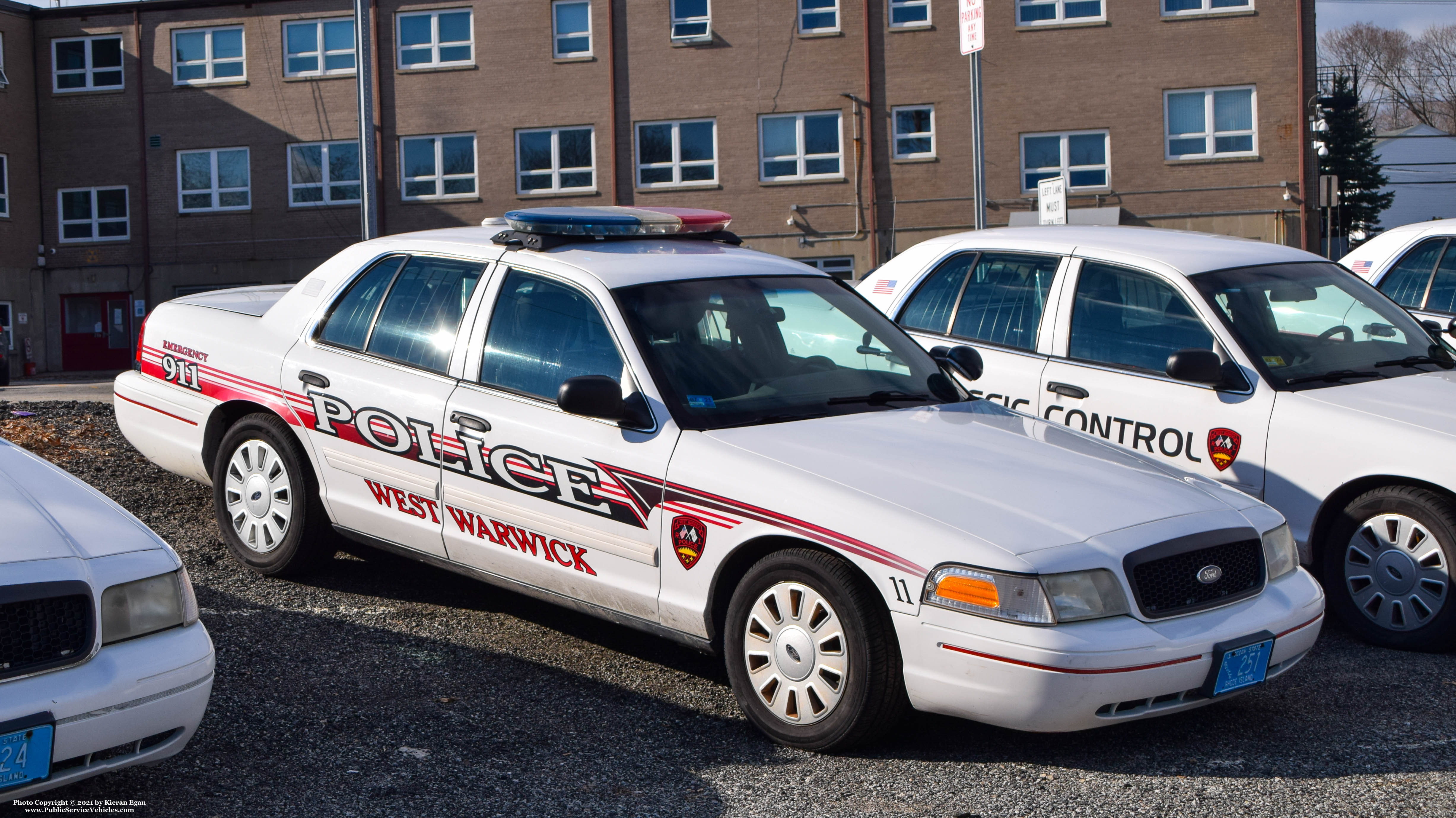 A photo  of West Warwick Police
            Car 11, a 2009-2011 Ford Crown Victoria Police Interceptor             taken by Kieran Egan