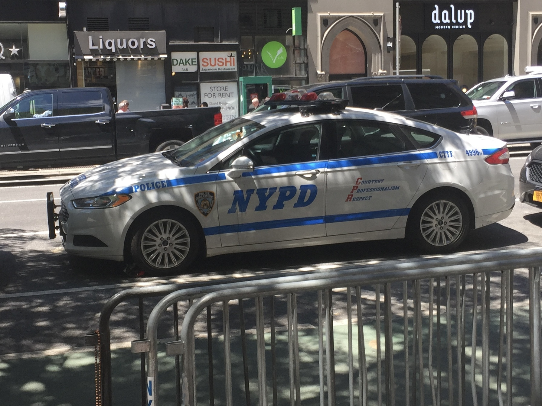 A photo  of New York Police Department
            Cruiser 4996 14, a 2014 Ford Fusion             taken by @riemergencyvehicles