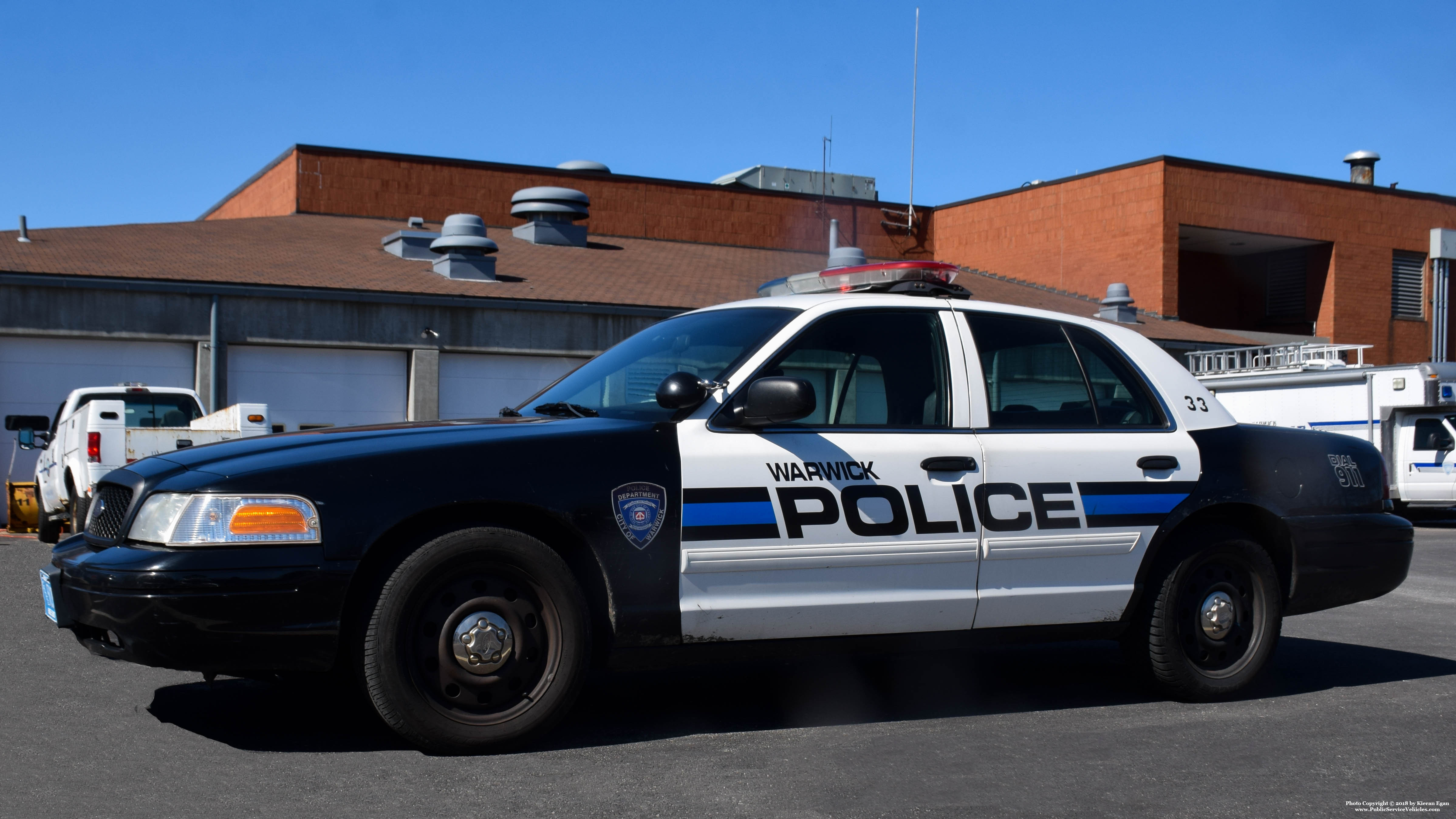 A photo  of Warwick Police
            Cruiser R-33, a 2009-2011 Ford Crown Victoria Police Interceptor             taken by Kieran Egan