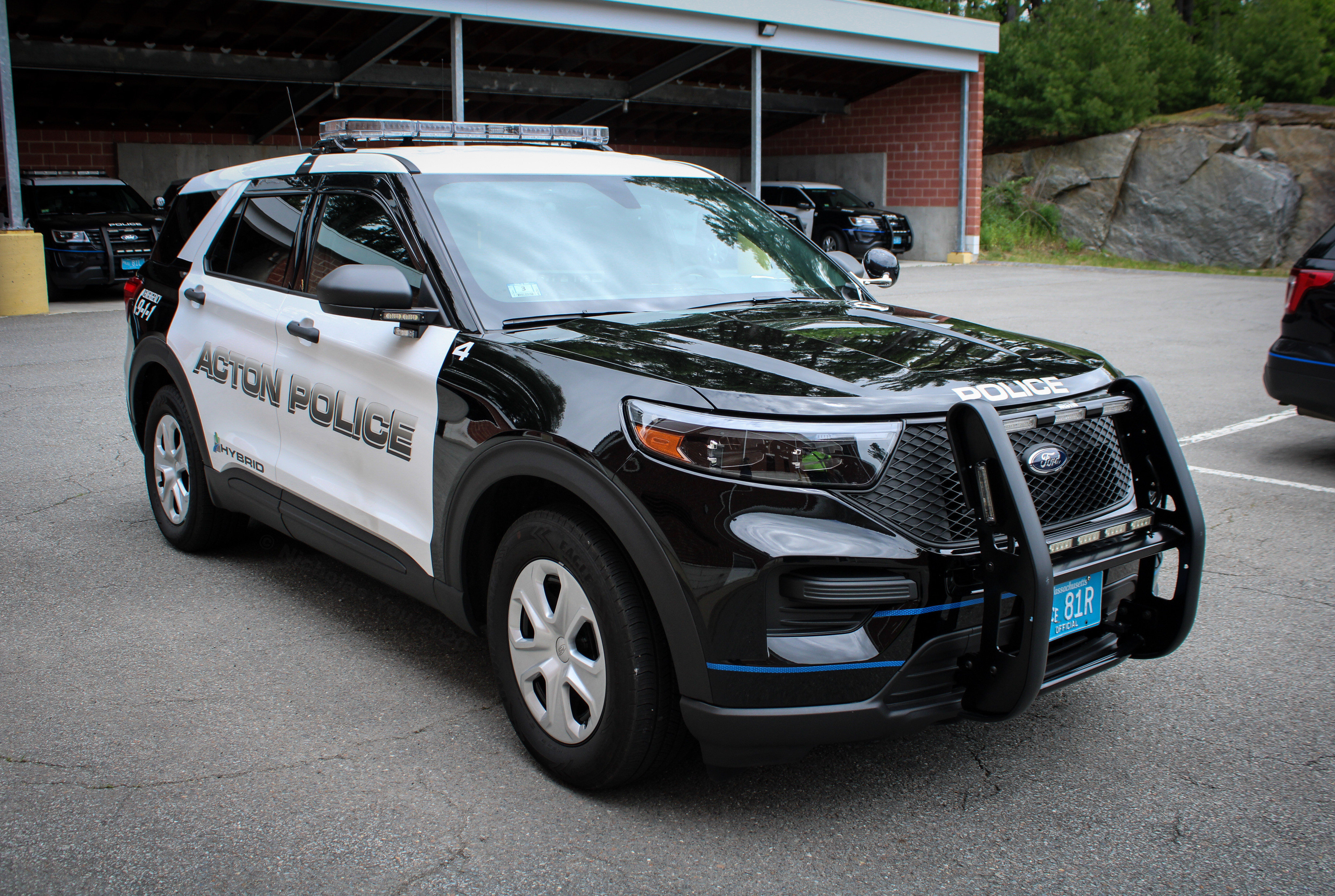 A photo  of Acton Police
            Car 4, a 2020 Ford Police Interceptor Utility Hybrid             taken by Nicholas You