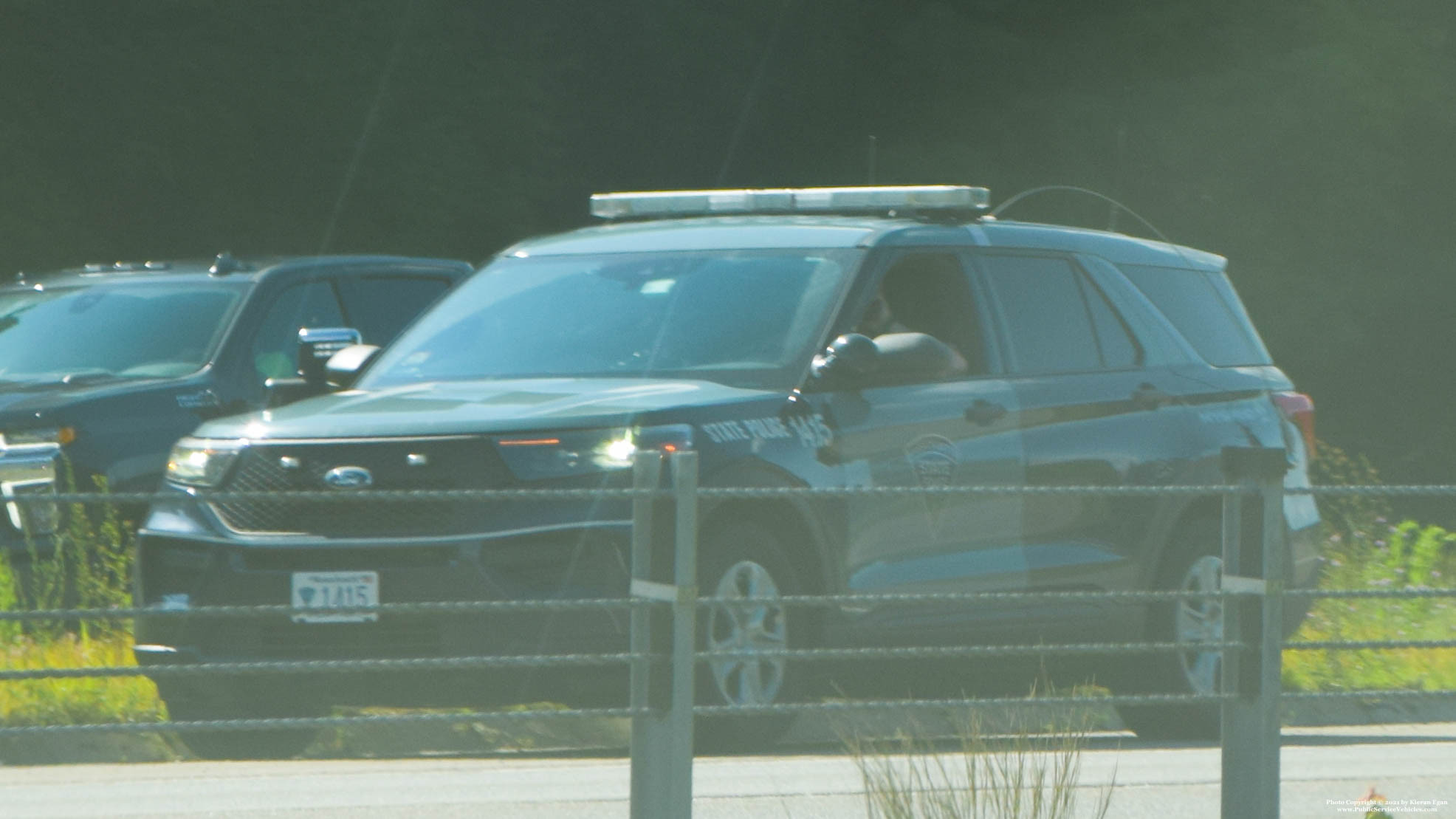 A photo  of Massachusetts State Police
            Cruiser 1415, a 2020 Ford Police Interceptor Utility Hybrid             taken by Kieran Egan