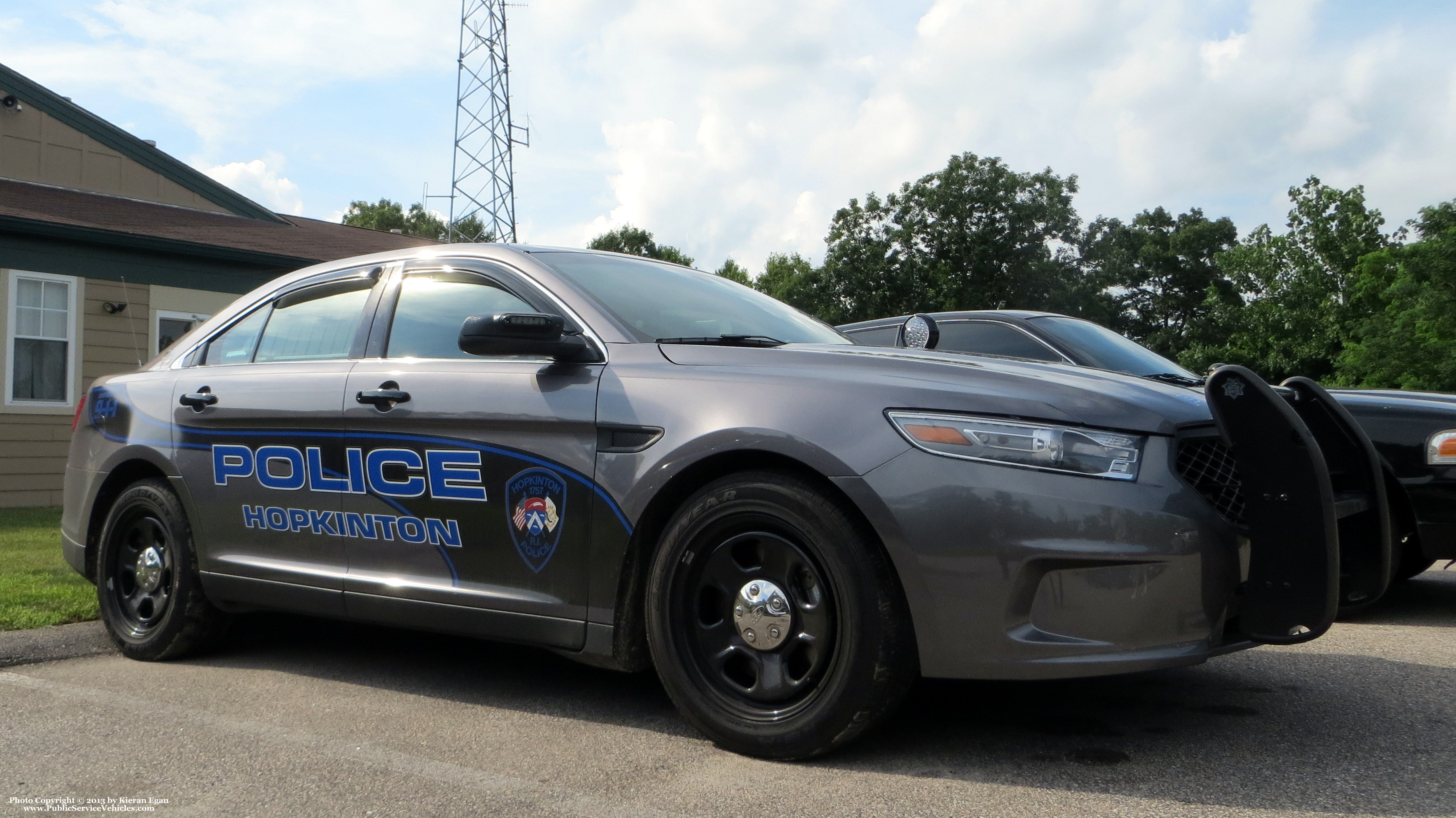 A photo  of Hopkinton Police
            Cruiser 310, a 2013 Ford Police Interceptor Sedan             taken by Kieran Egan