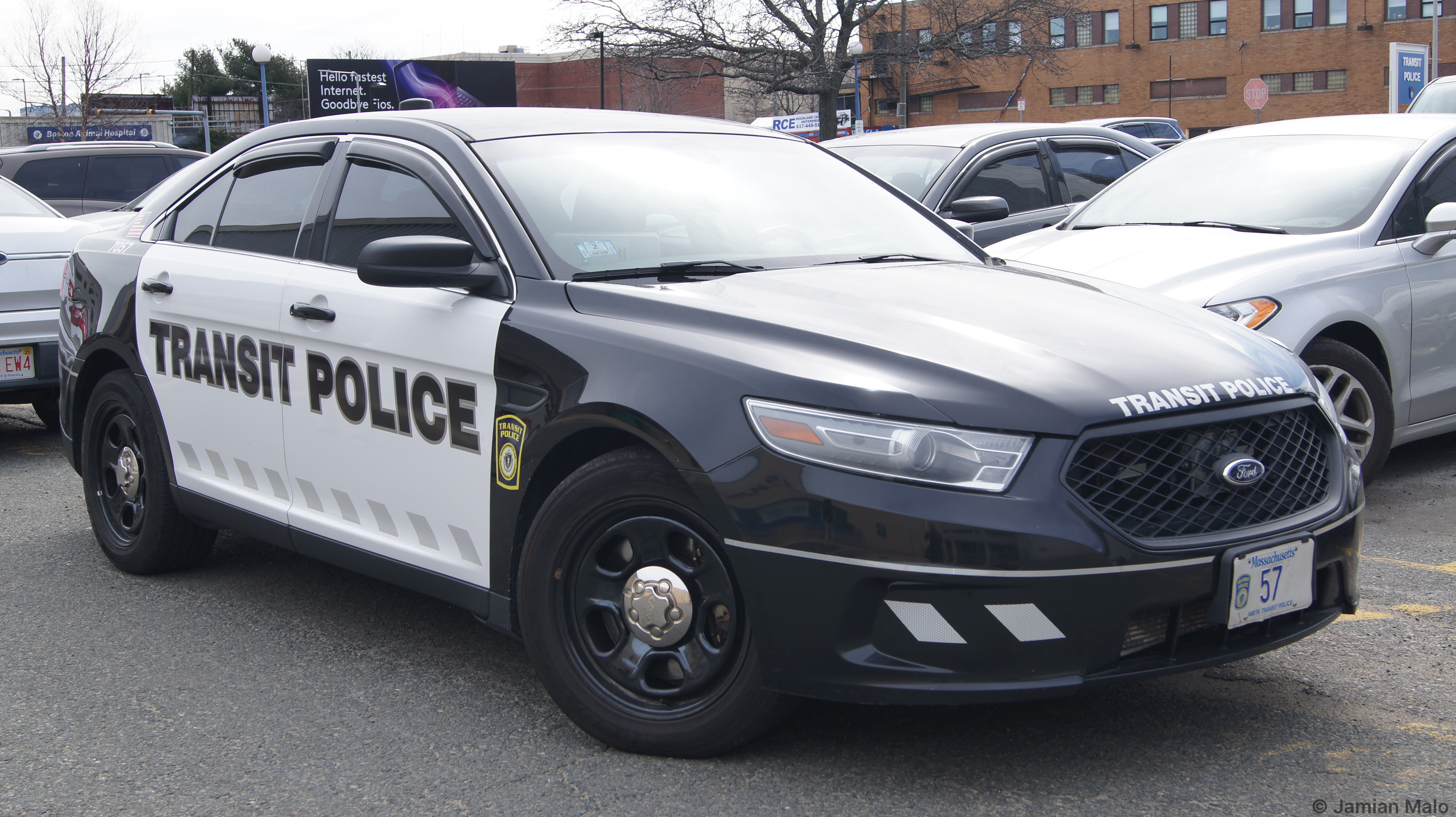 A photo  of MBTA Transit Police
            Cruiser 7057, a 2013-2019 Ford Police Interceptor Sedan             taken by Jamian Malo