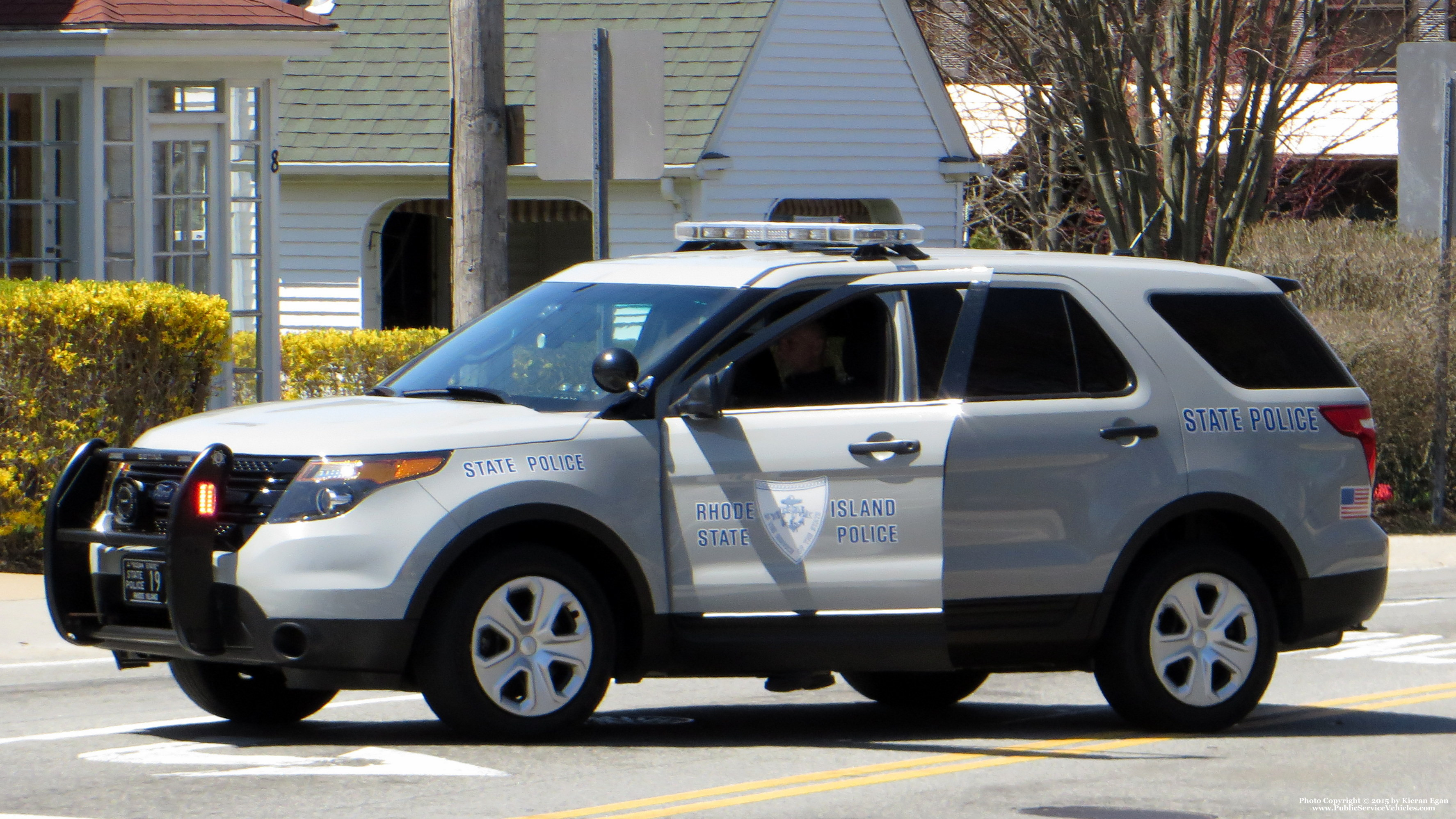 A photo  of Rhode Island State Police
            Cruiser 19, a 2013-2015 Ford Police Interceptor Utility             taken by Kieran Egan