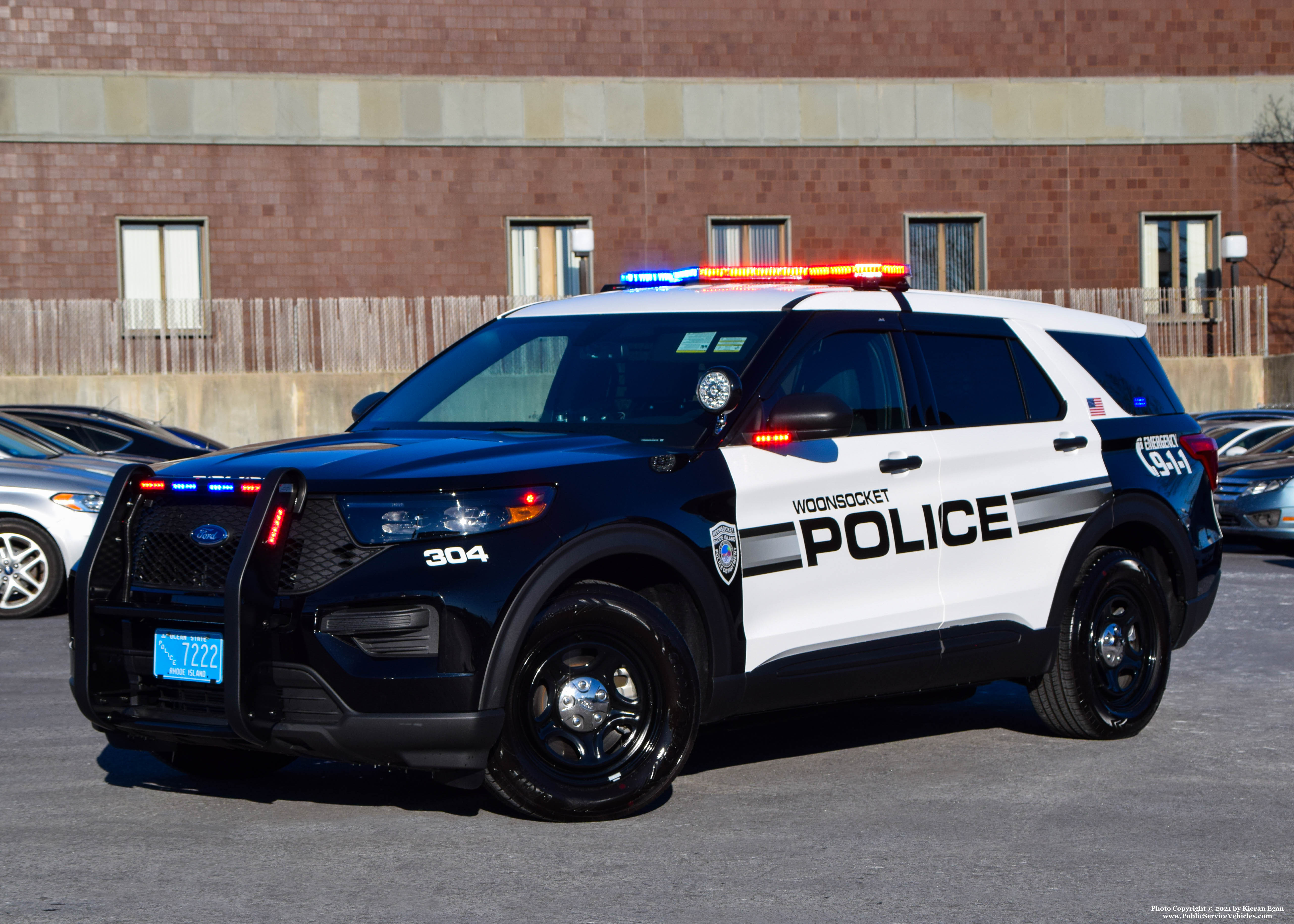 A photo  of Woonsocket Police
            Cruiser 304, a 2021 Ford Police Interceptor Utility             taken by Kieran Egan