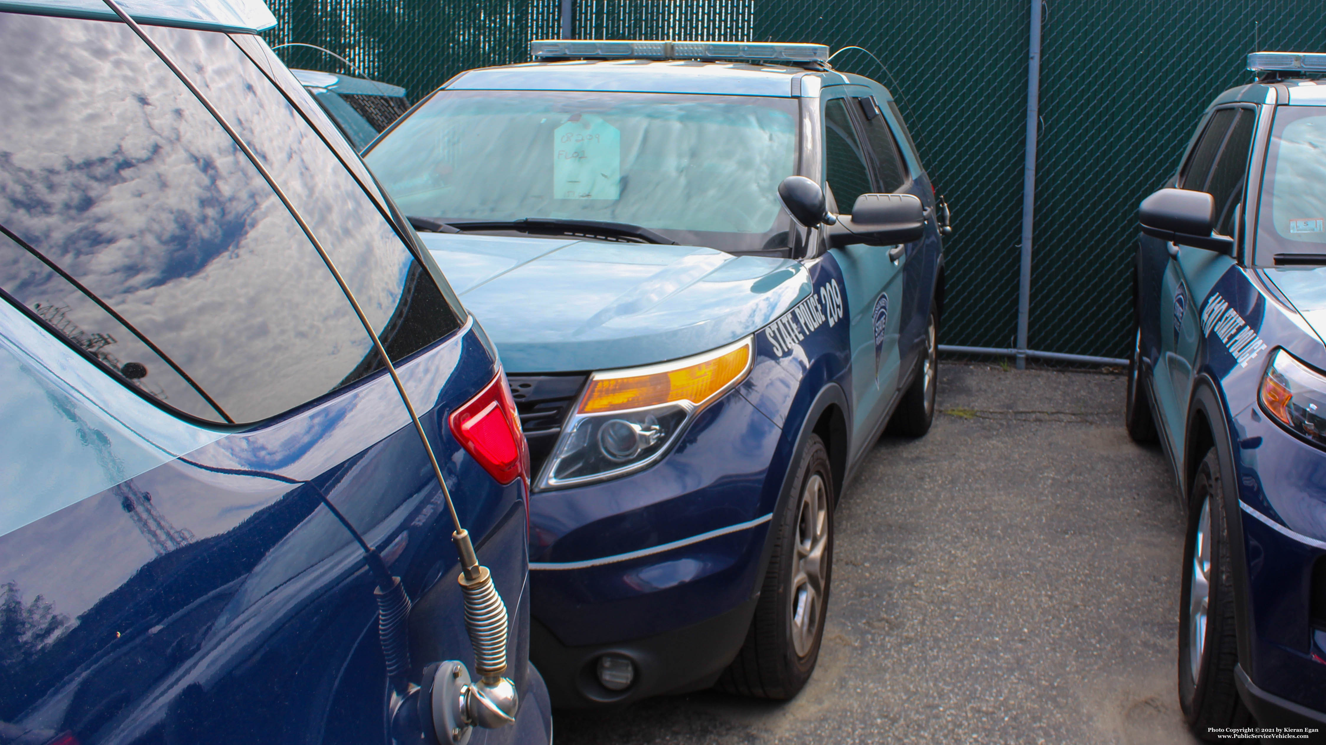 A photo  of Massachusetts State Police
            Cruiser 209, a 2015 Ford Police Interceptor Utility             taken by Kieran Egan