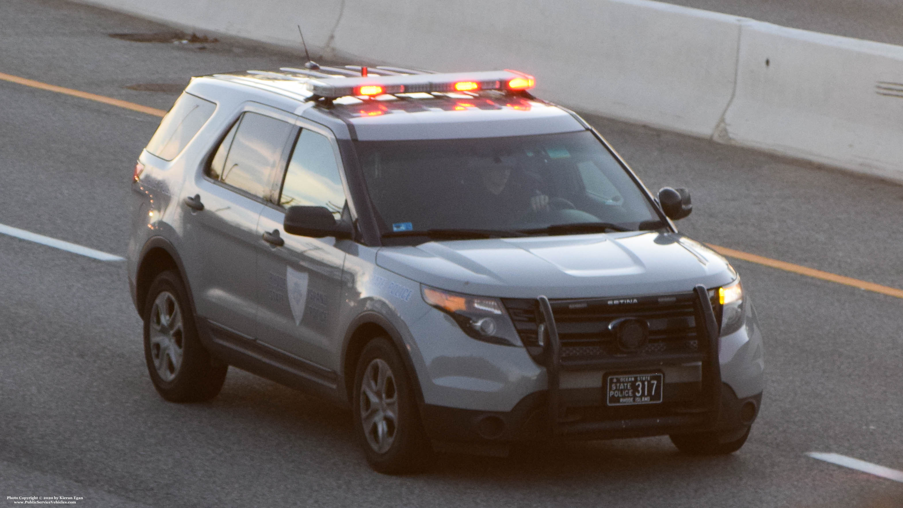 A photo  of Rhode Island State Police
            Cruiser 317, a 2013-2015 Ford Police Interceptor Utility             taken by Kieran Egan