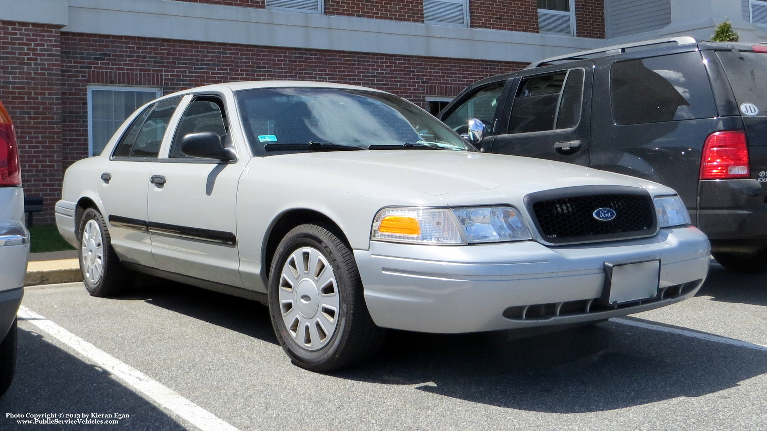 A photo  of Rhode Island State Police
            Unmarked Unit, a 2006-2008 Ford Crown Victoria Police Interceptor             taken by Kieran Egan