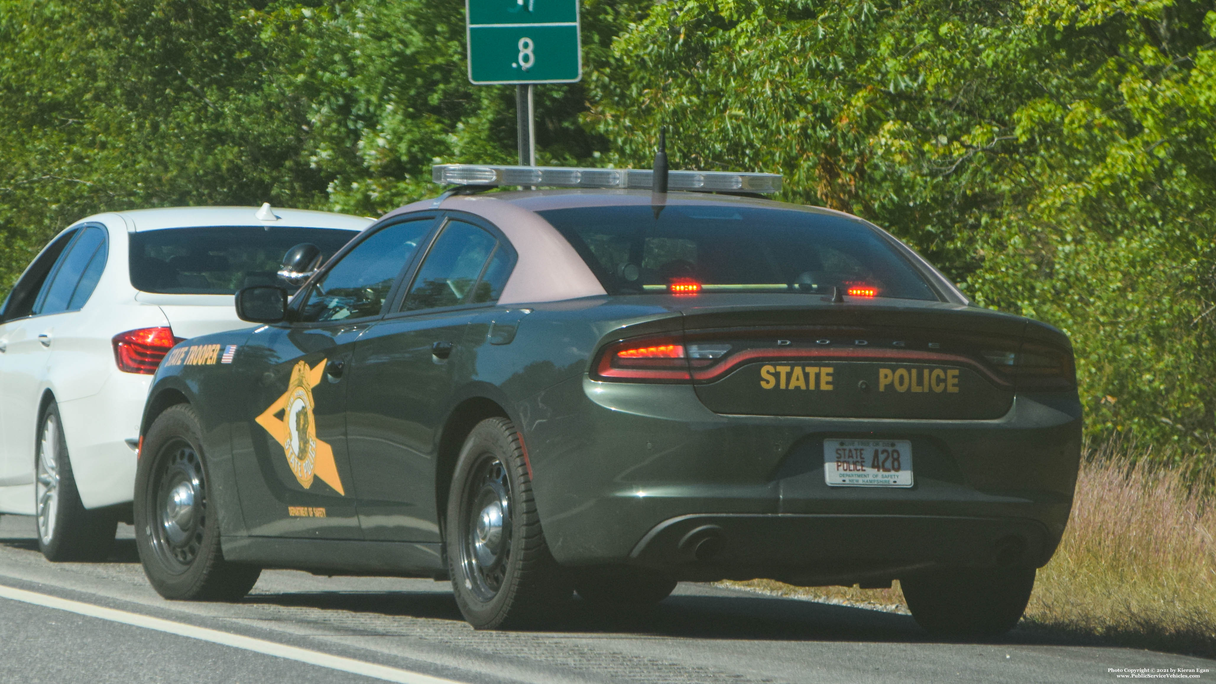 A photo  of New Hampshire State Police
            Cruiser 428, a 2015-2019 Dodge Charger             taken by Kieran Egan