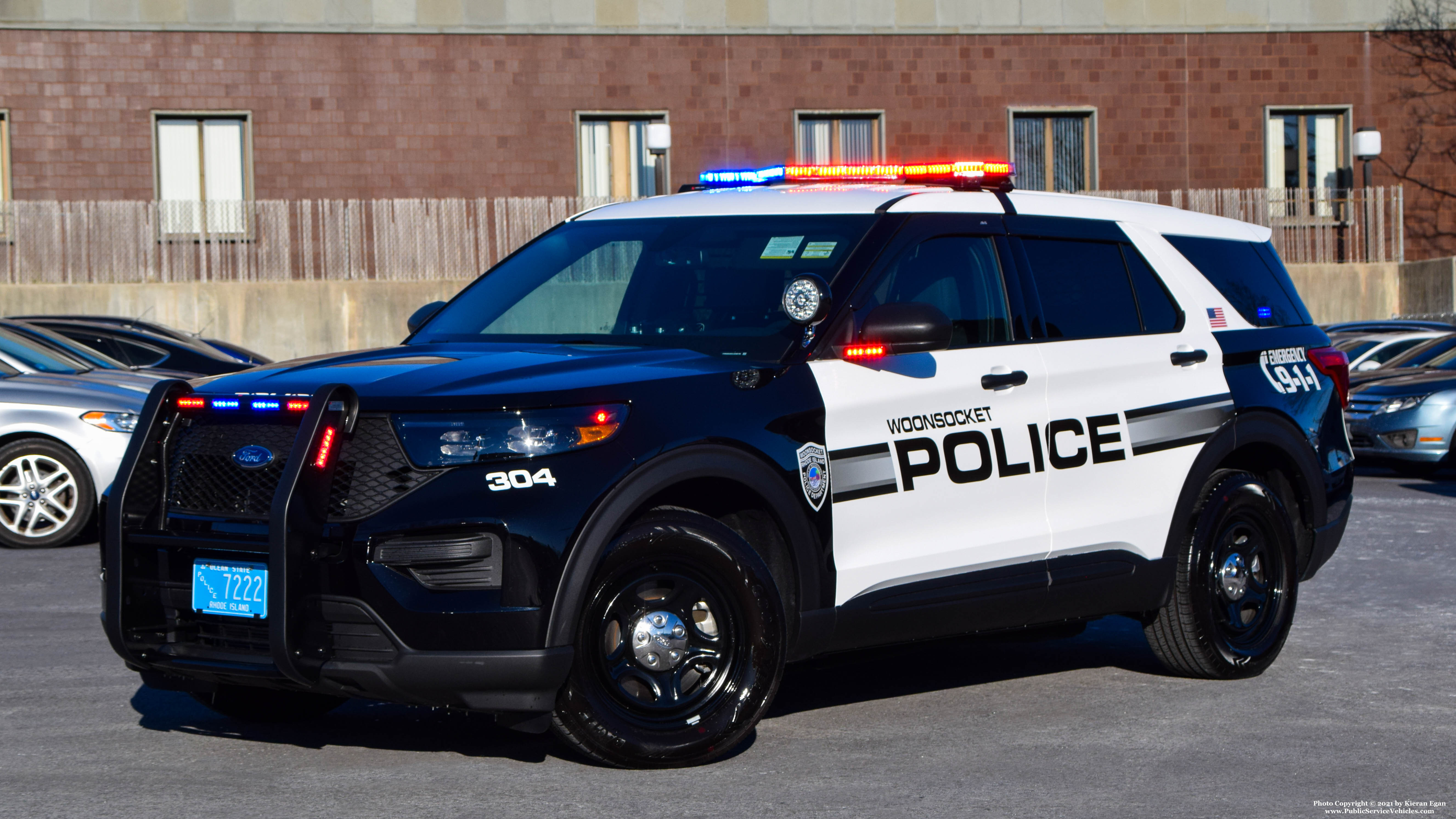 A photo  of Woonsocket Police
            Cruiser 304, a 2021 Ford Police Interceptor Utility             taken by Kieran Egan