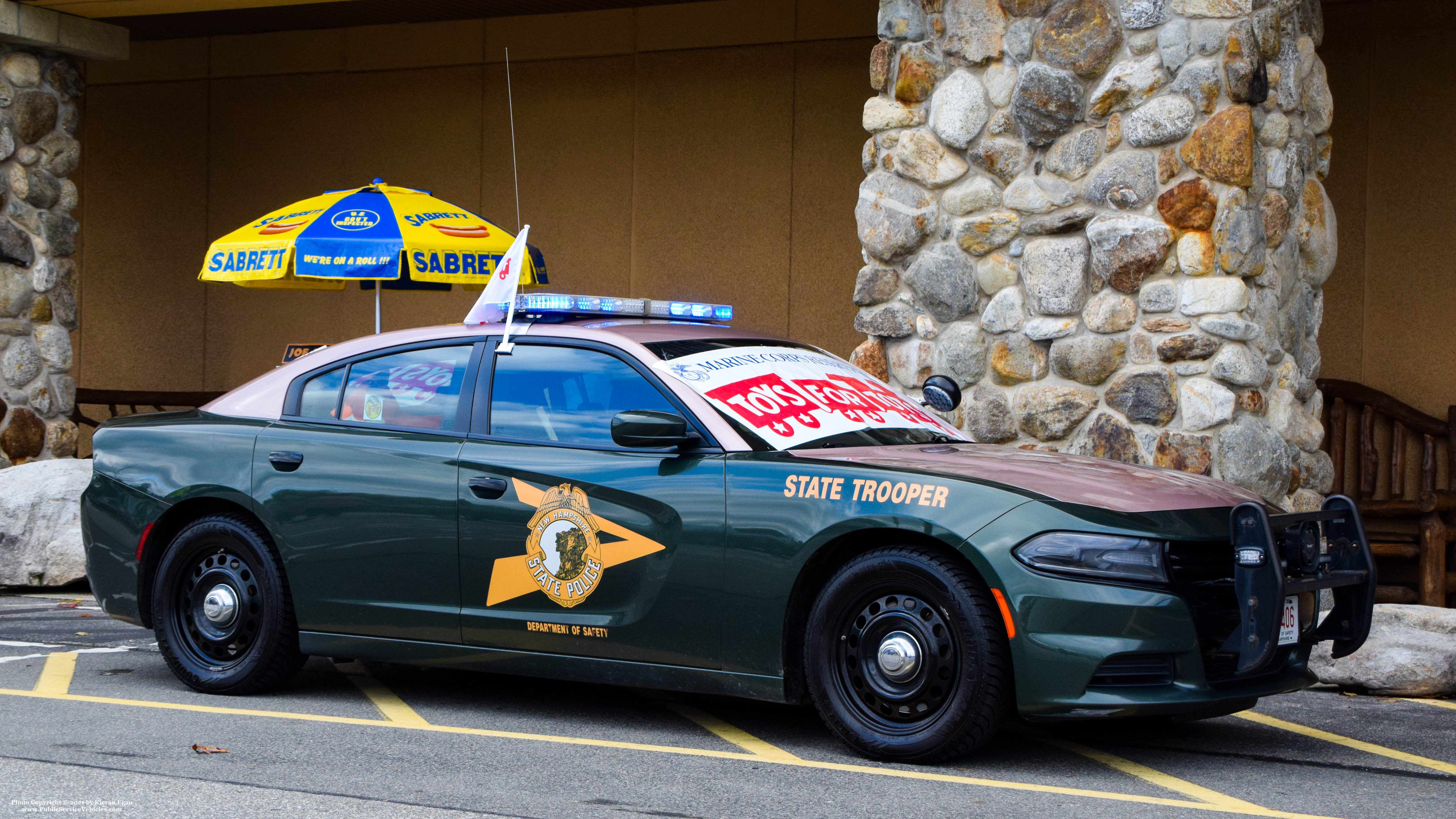 A photo  of New Hampshire State Police
            Cruiser 406, a 2015-2019 Dodge Charger             taken by Kieran Egan