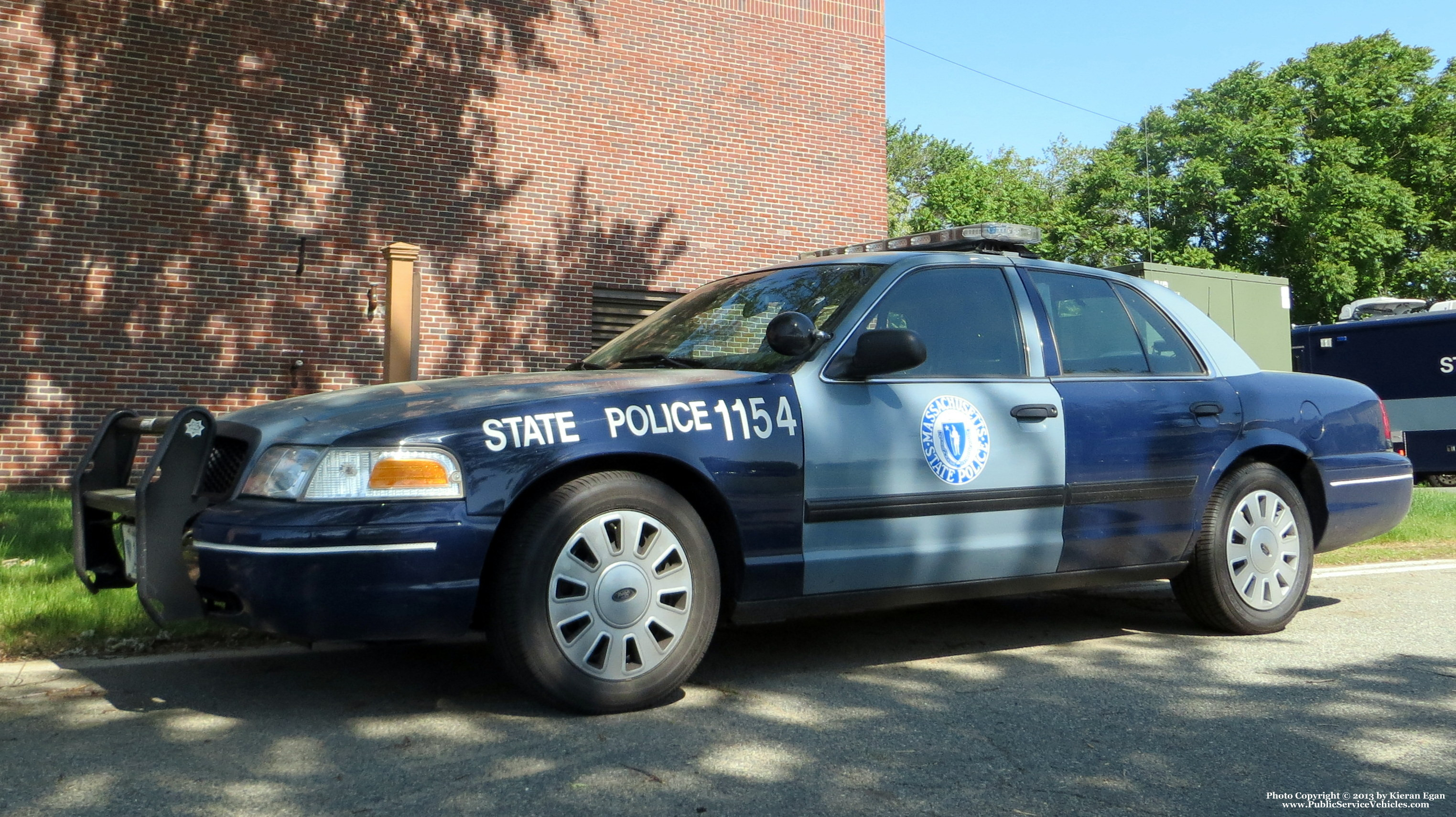 A photo  of Massachusetts State Police
            Cruiser 1154, a 2009-2011 Ford Crown Victoria Police Interceptor             taken by Kieran Egan