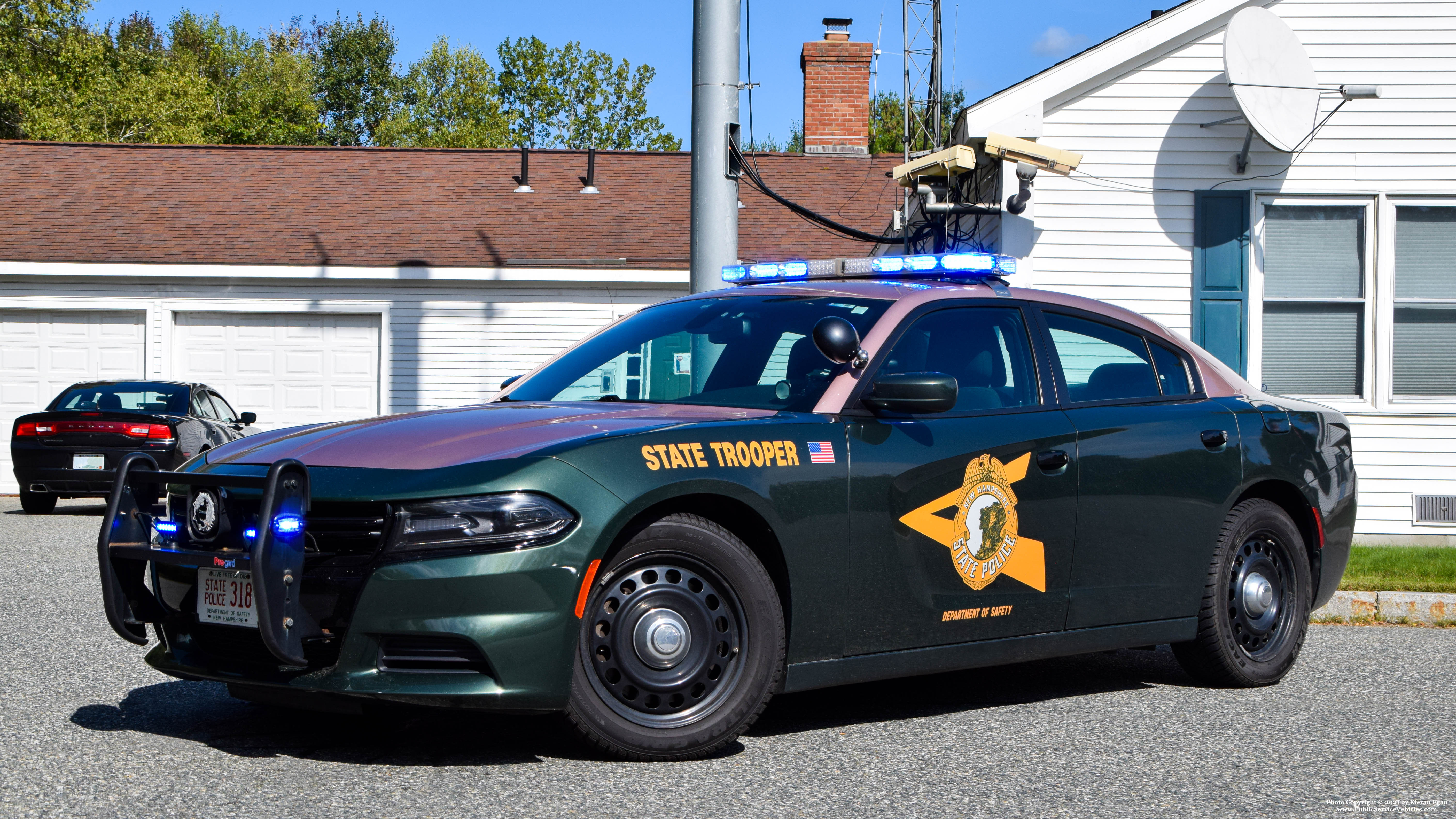 A photo  of New Hampshire State Police
            Cruiser 318, a 2015-2019 Dodge Charger             taken by Kieran Egan