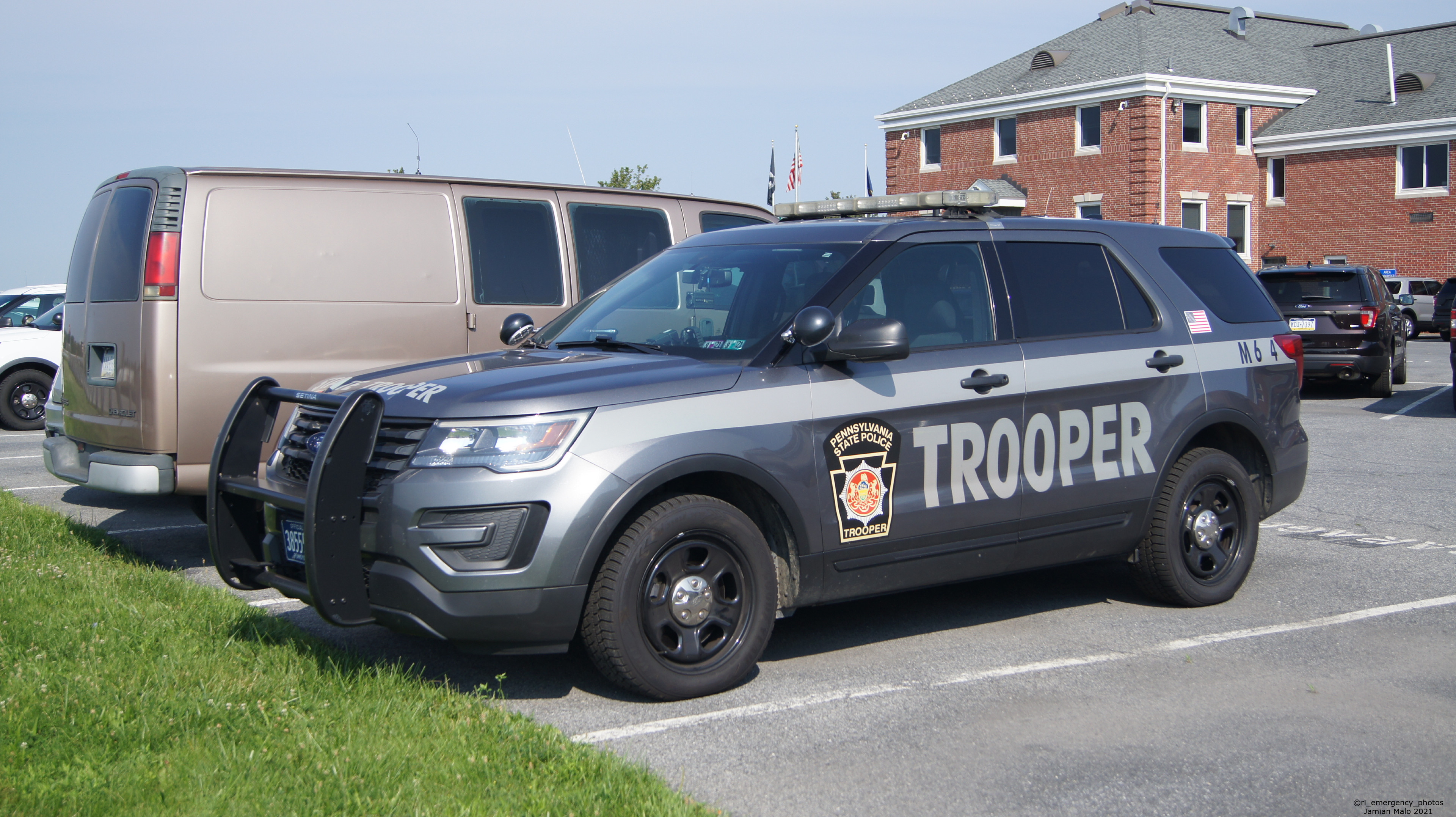 A photo  of Pennsylvania State Police
            Cruiser M6 4, a 2016-2019 Ford Police Interceptor Utility             taken by Jamian Malo
