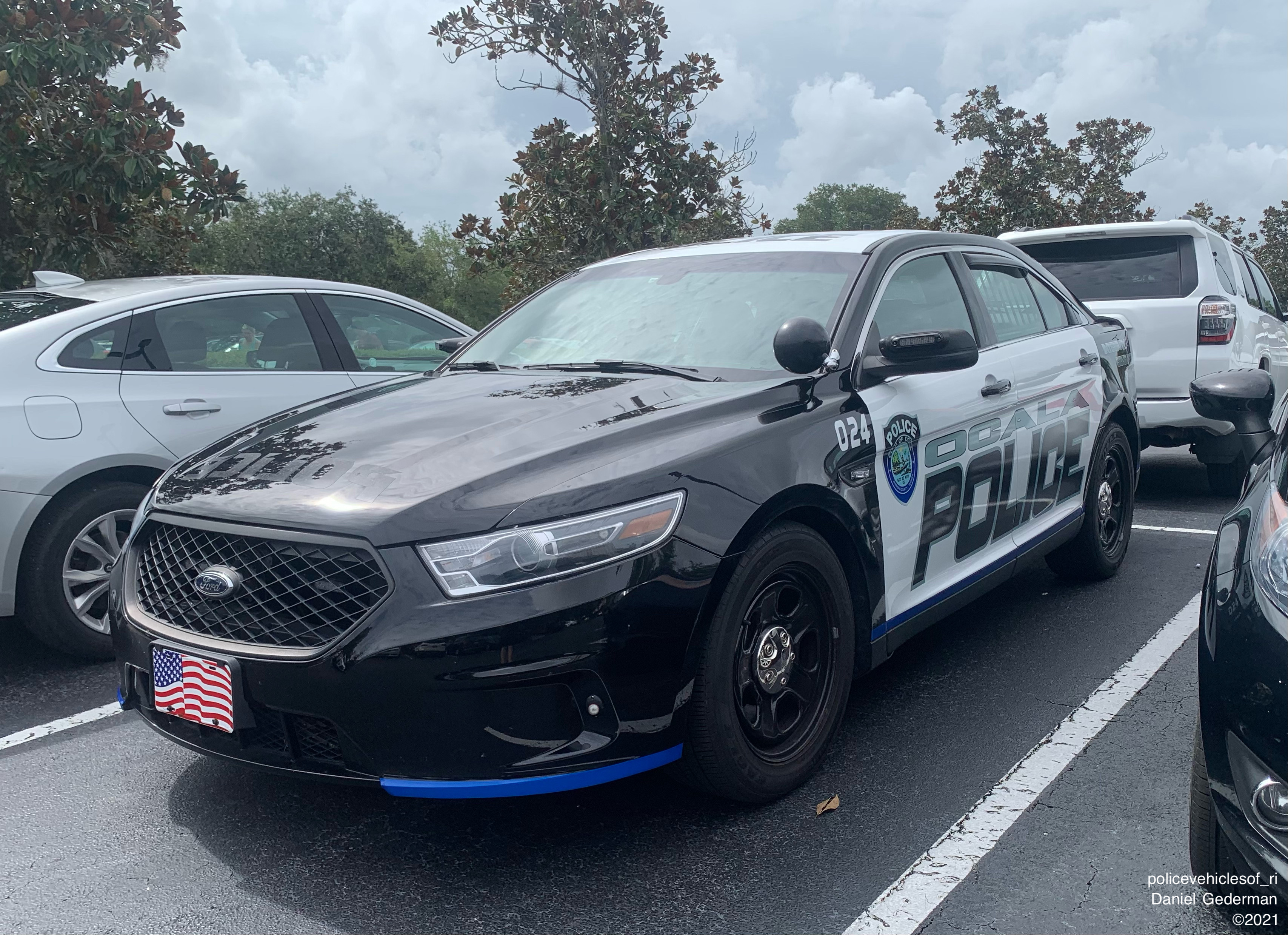 A photo  of Ocala Police
            Cruiser 024, a 2013-2019 Ford Police Interceptor Sedan             taken by Dan Gederman