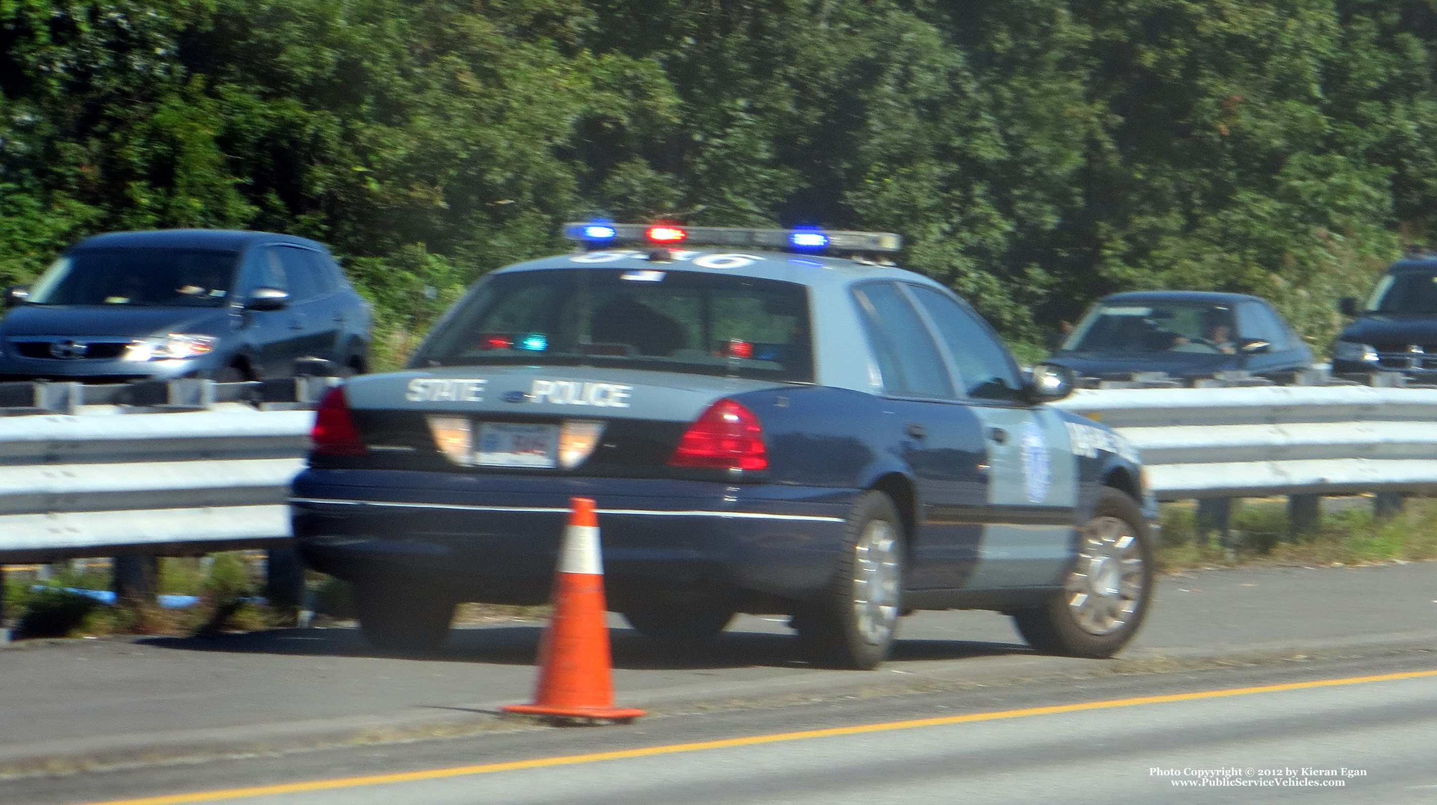 A photo  of Massachusetts State Police
            Cruiser 646, a 2003-2005 Ford Crown Victoria Police Interceptor             taken by Kieran Egan