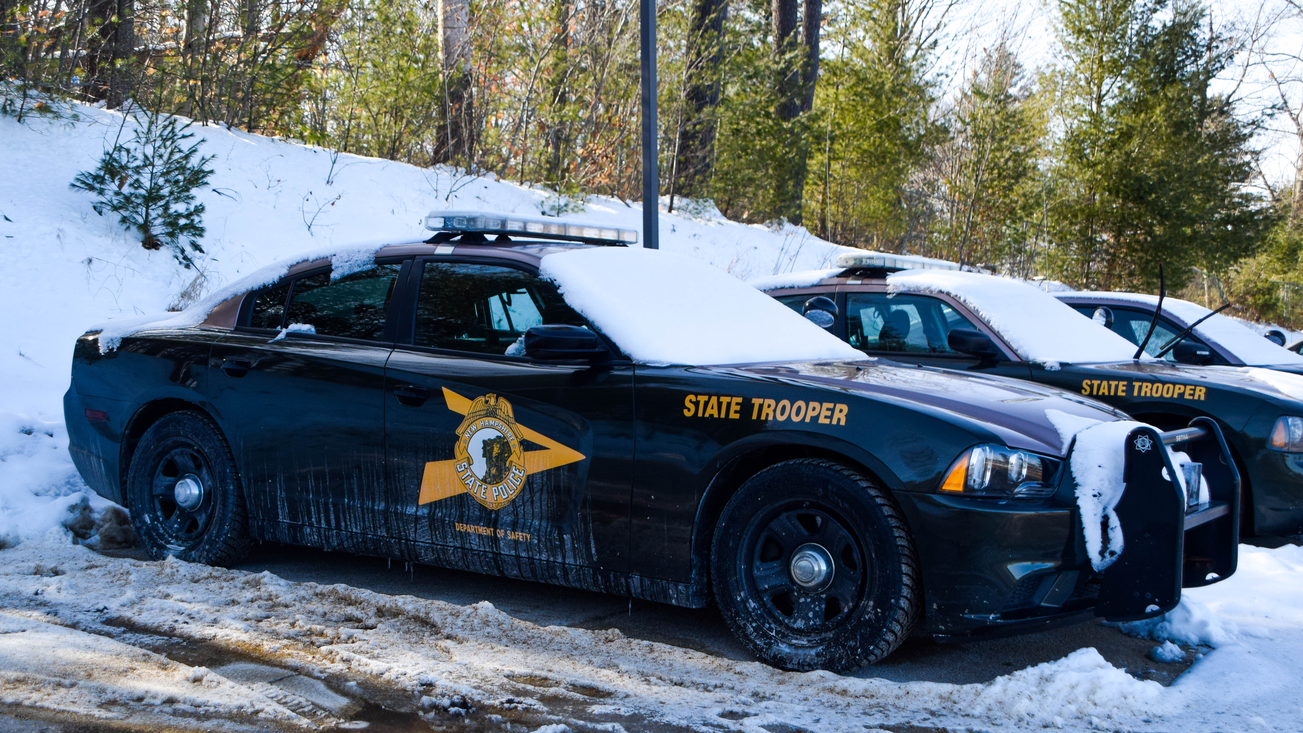 A photo  of New Hampshire State Police
            Cruiser 818, a 2011-2013 Dodge Charger             taken by Kieran Egan