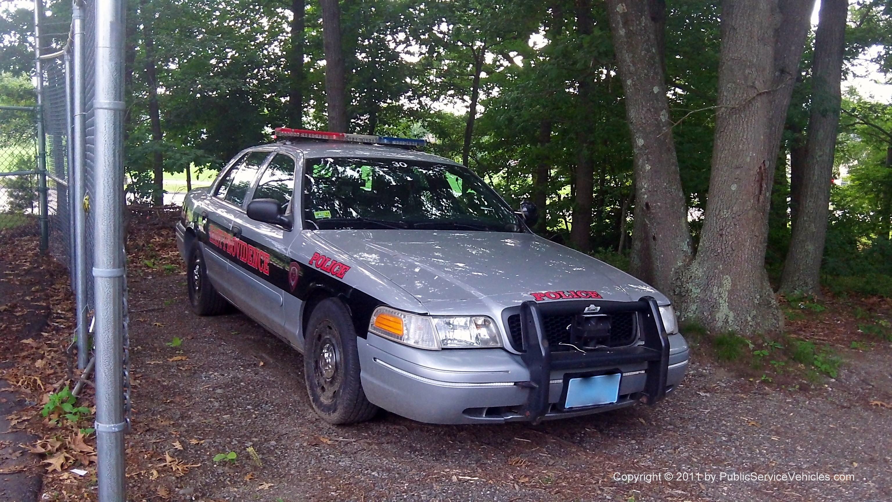 A photo  of East Providence Police
            Car 30, a 2003-2005 Ford Crown Victoria Police Interceptor             taken by Kieran Egan