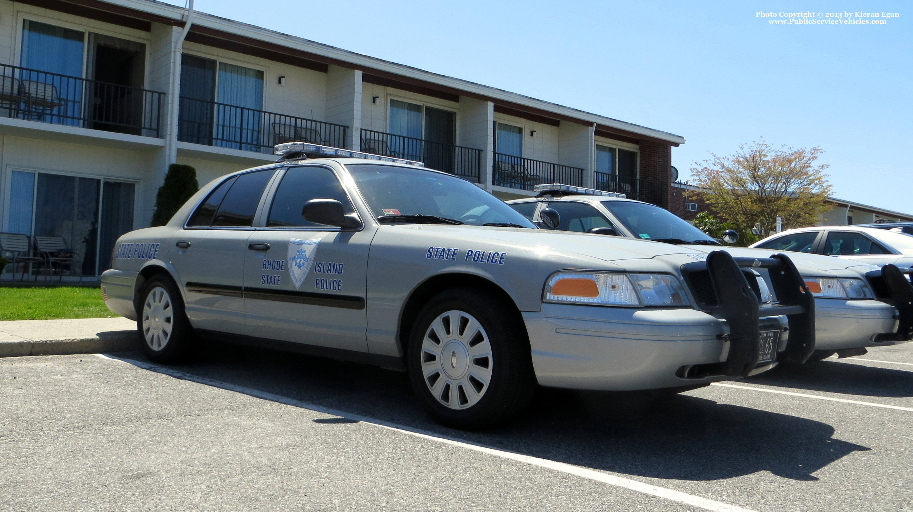 A photo  of Rhode Island State Police
            Cruiser 65, a 2006-2008 Ford Crown Victoria Police Interceptor             taken by Kieran Egan