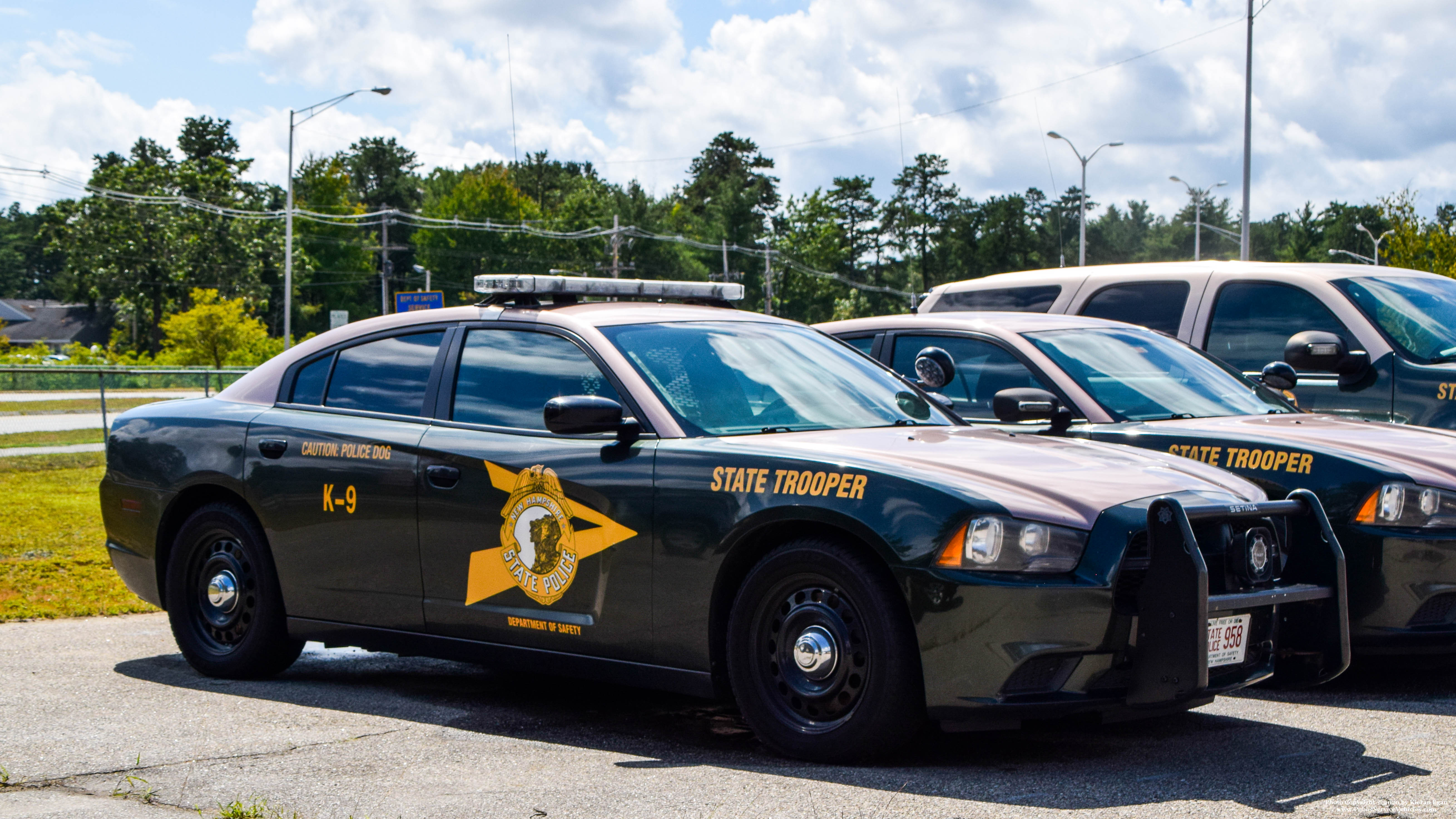 A photo  of New Hampshire State Police
            Cruiser 958, a 2011-2014 Dodge Charger             taken by Kieran Egan