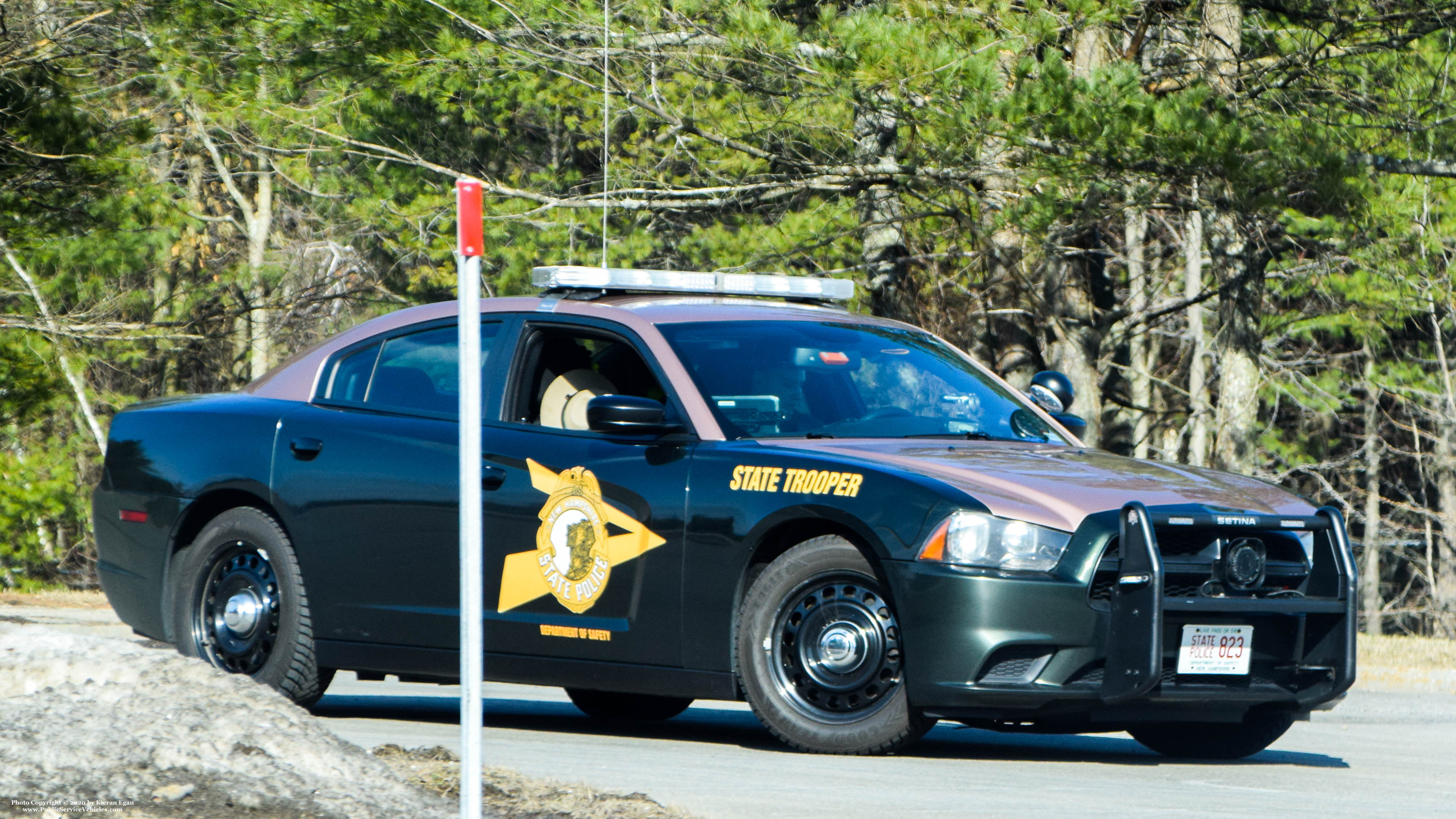 A photo  of New Hampshire State Police
            Cruiser 823, a 2011-2014 Dodge Charger             taken by Kieran Egan