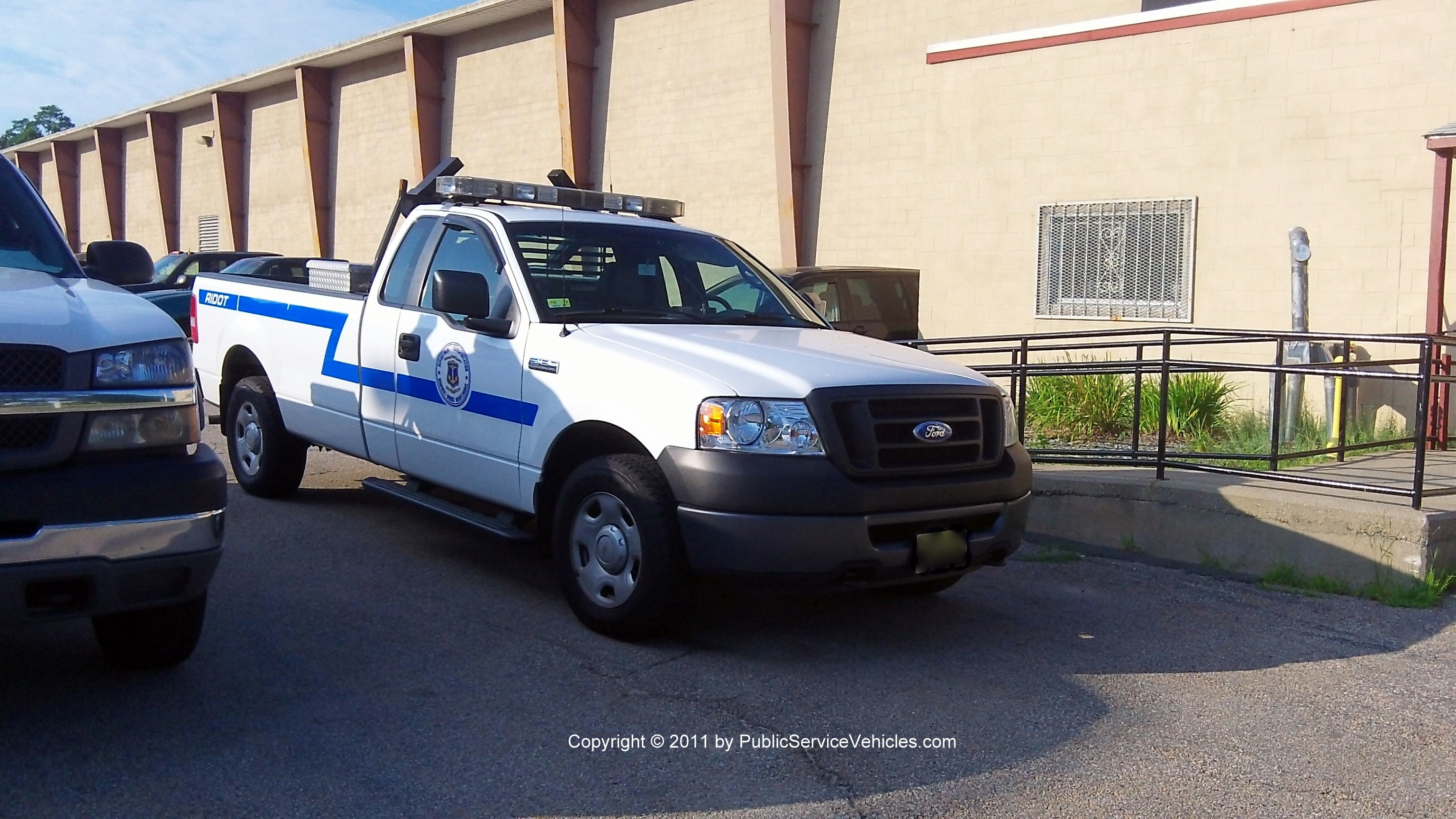 A photo  of Rhode Island Department of Transportation
            Truck 167, a 2004-2008 Ford F-150             taken by Kieran Egan