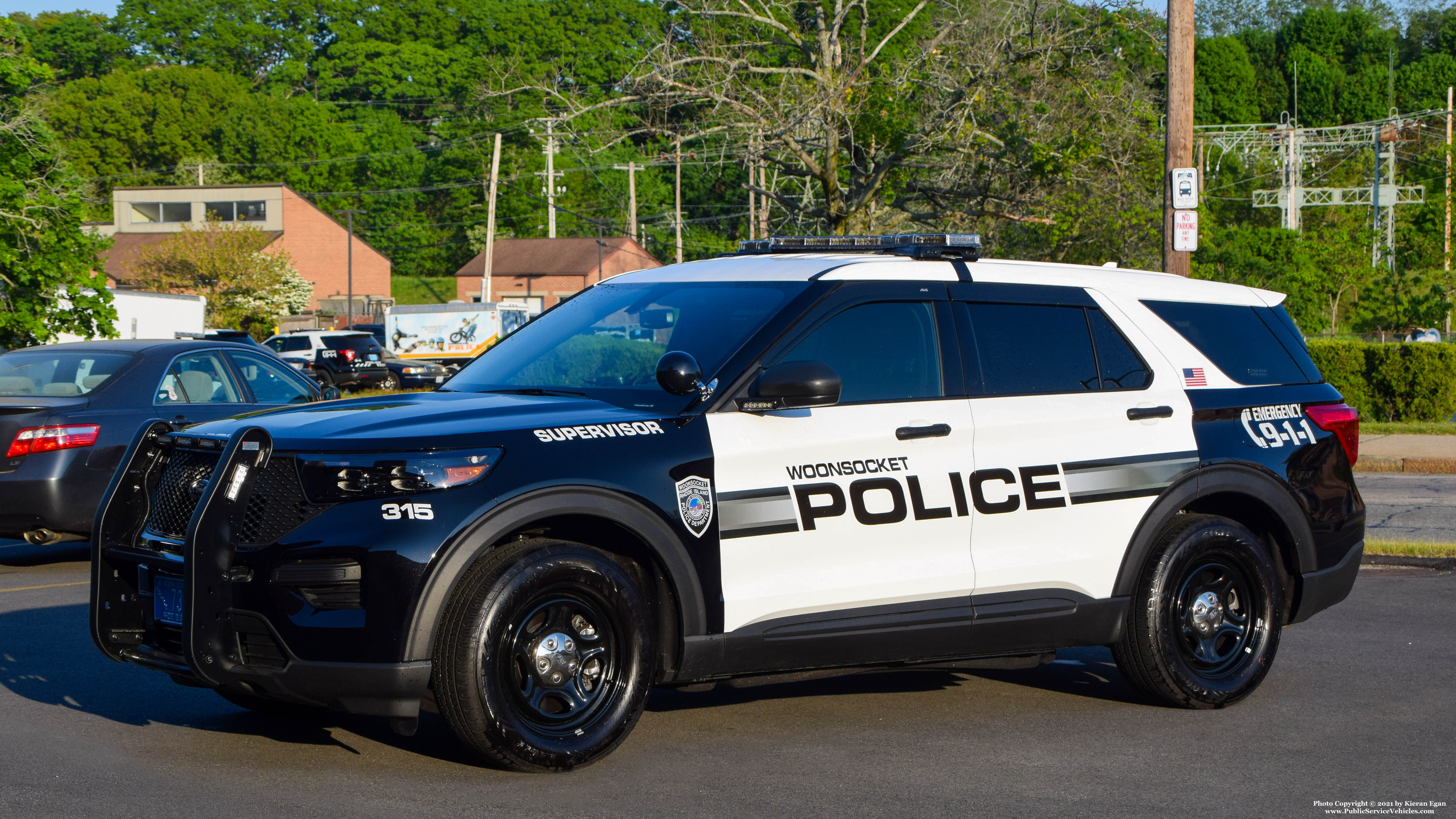 A photo  of Woonsocket Police
            Cruiser 315, a 2021 Ford Police Interceptor Utility             taken by Kieran Egan