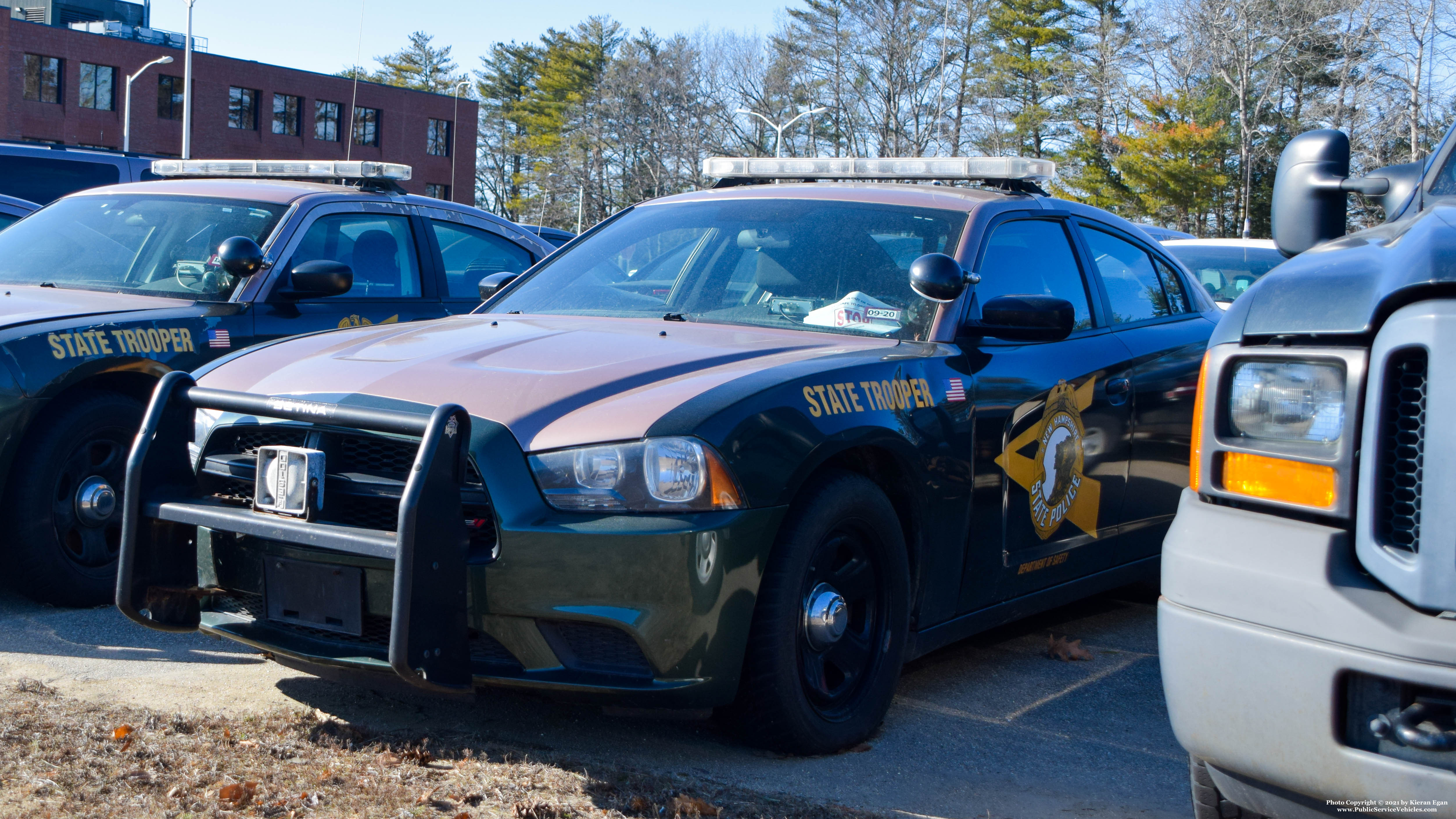 A photo  of New Hampshire State Police
            Unassigned Cruiser, a 2011-2014 Dodge Charger             taken by Kieran Egan