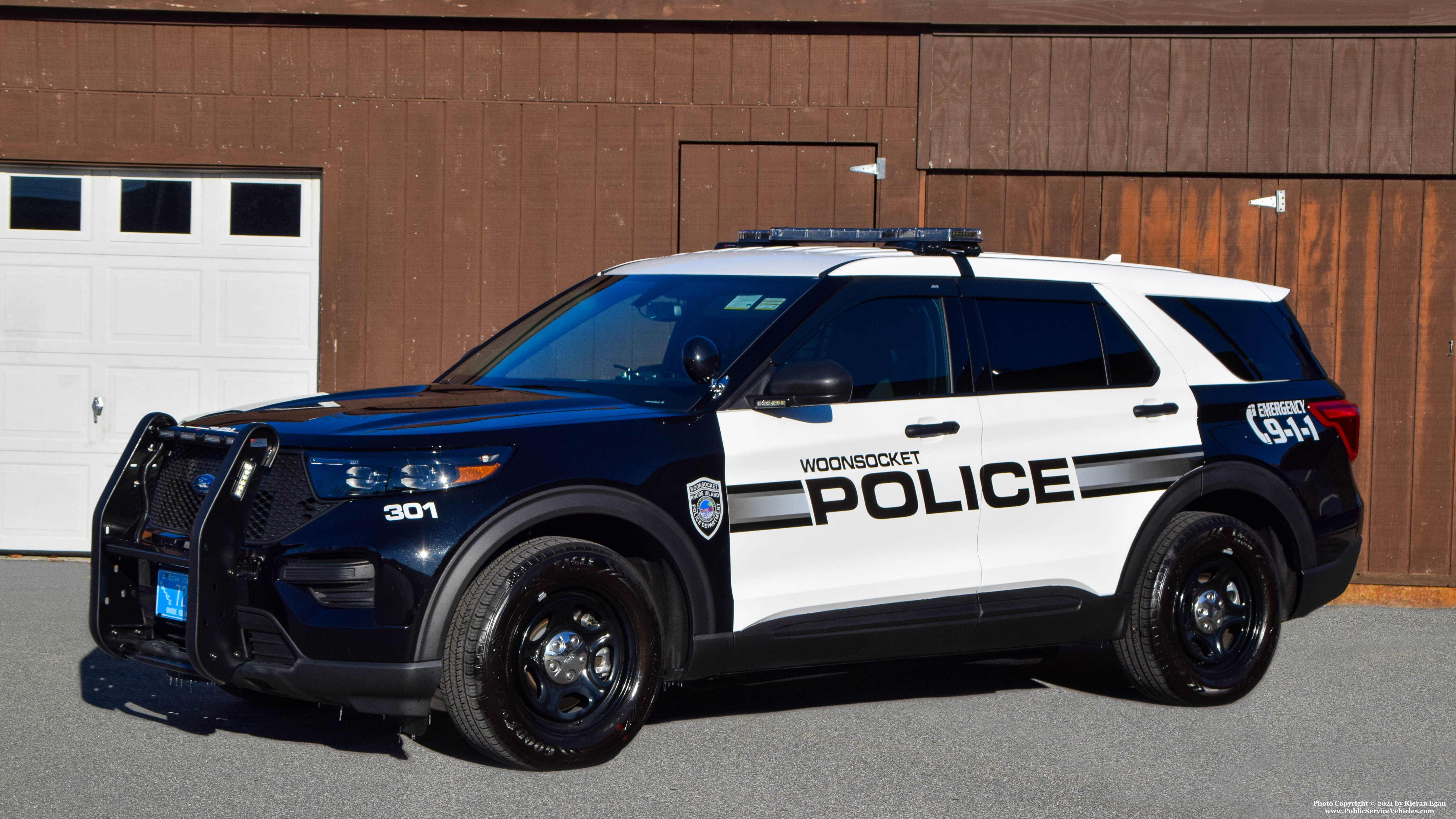A photo  of Woonsocket Police
            Cruiser 301, a 2021 Ford Police Interceptor Utility             taken by Kieran Egan
