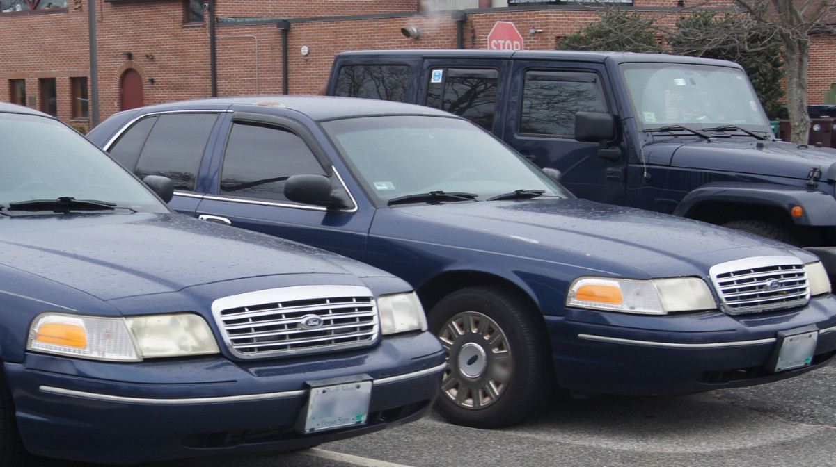 A photo  of Woonsocket Police
            Unmarked Unit, a 2003-2005 Ford Crown Victoria Police Interceptor             taken by Jamian Malo