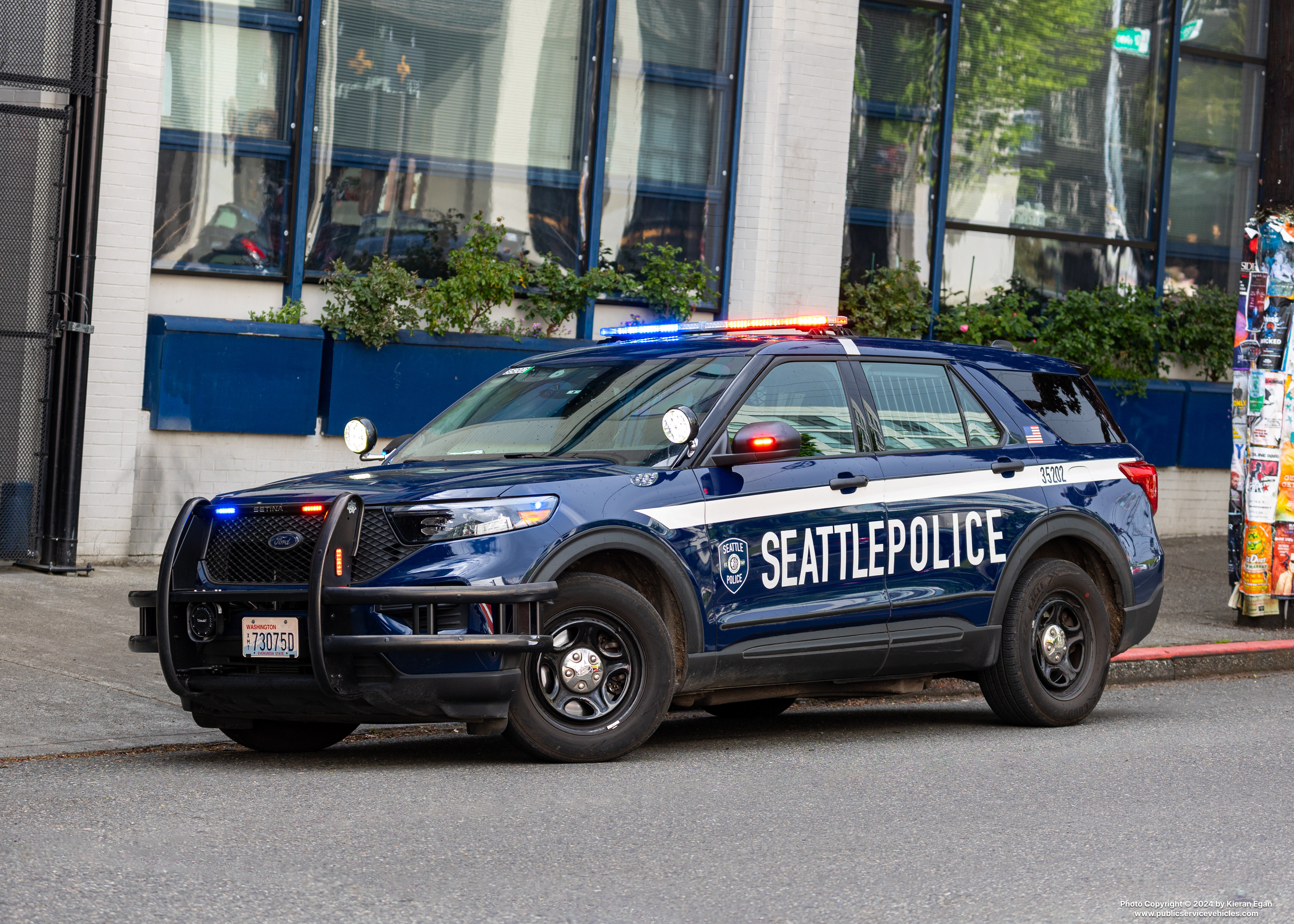 A photo  of Seattle Police
            Cruiser 35202, a 2021 Ford Police Interceptor Utility Hybrid             taken by Kieran Egan