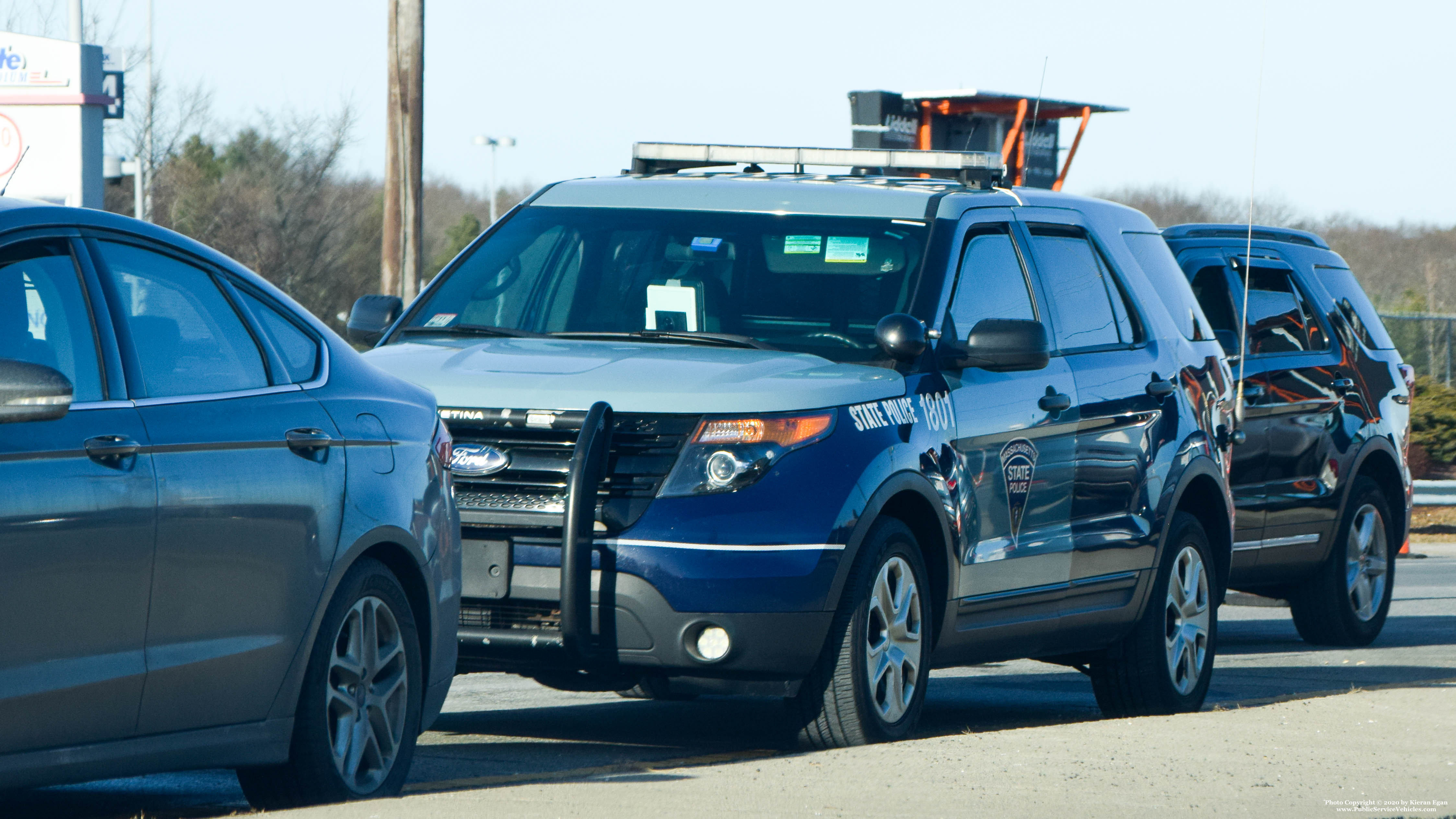 A photo  of Massachusetts State Police
            Cruiser 1801, a 2013-2014 Ford Police Interceptor Utility             taken by Kieran Egan