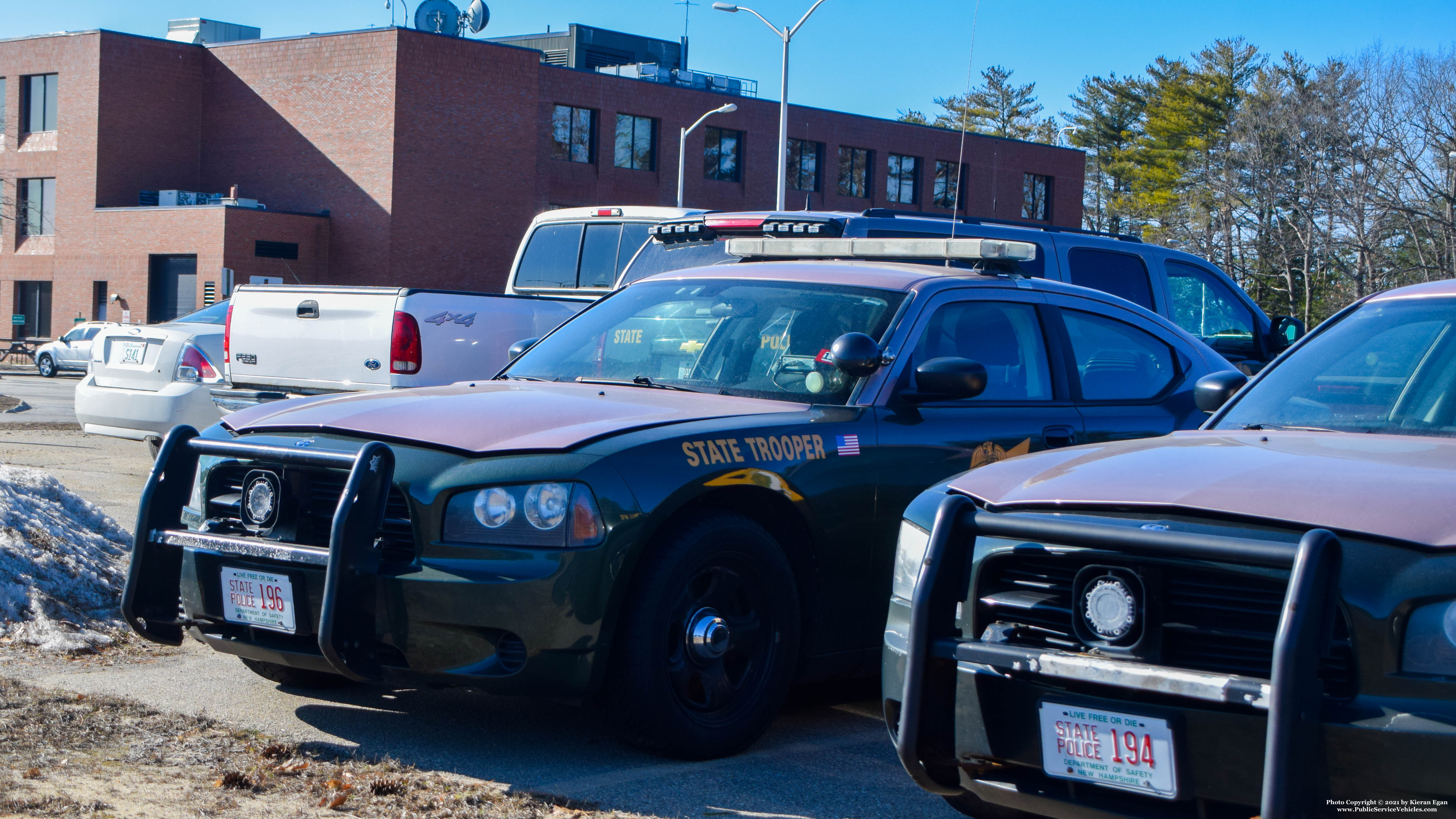 A photo  of New Hampshire State Police
            Cruiser 196, a 2006-2010 Dodge Charger             taken by Kieran Egan