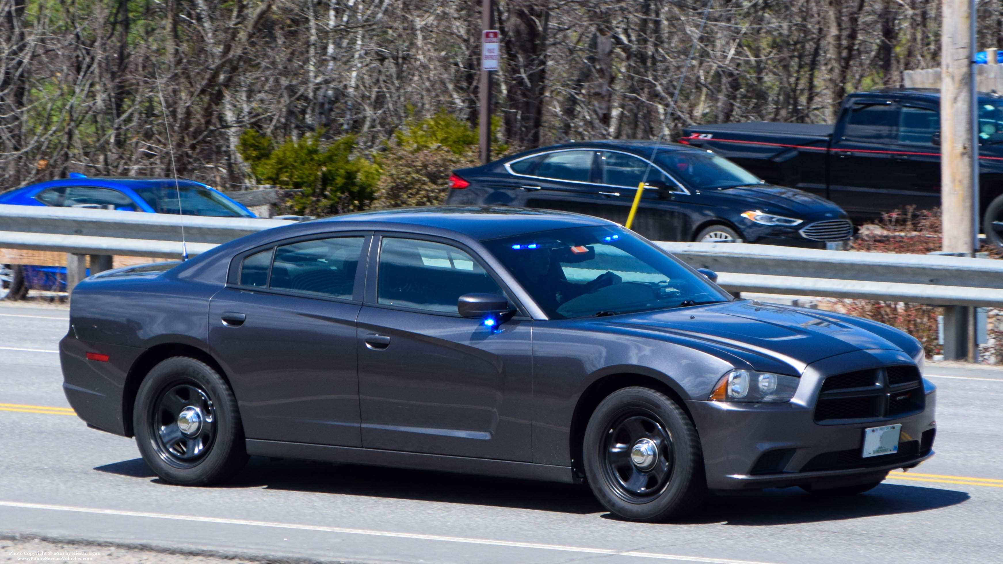 A photo  of New Hampshire State Police
            Unmarked Unit, a 2011-2014 Dodge Charger             taken by Kieran Egan