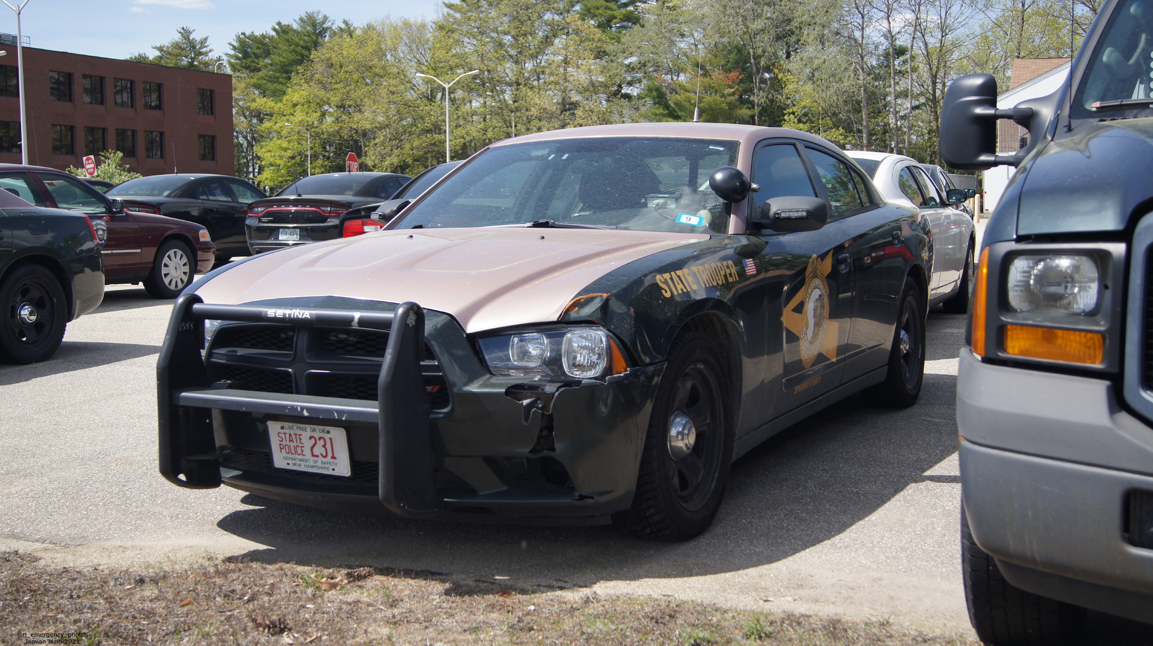 A photo  of New Hampshire State Police
            Cruiser 231, a 2011-2014 Dodge Charger             taken by Jamian Malo